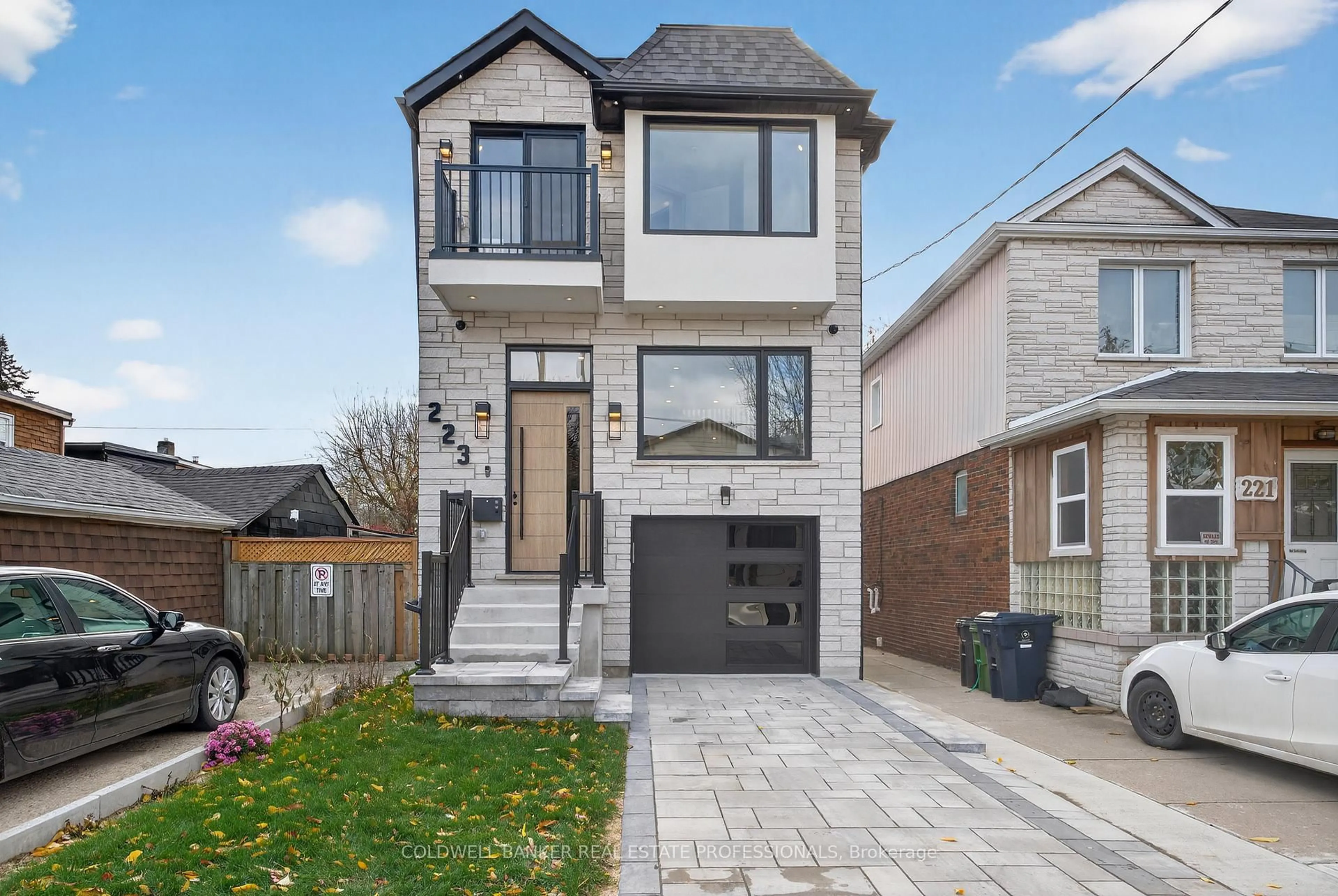 Home with brick exterior material, street for 223 Queensdale Ave, Toronto Ontario M4C 2B1