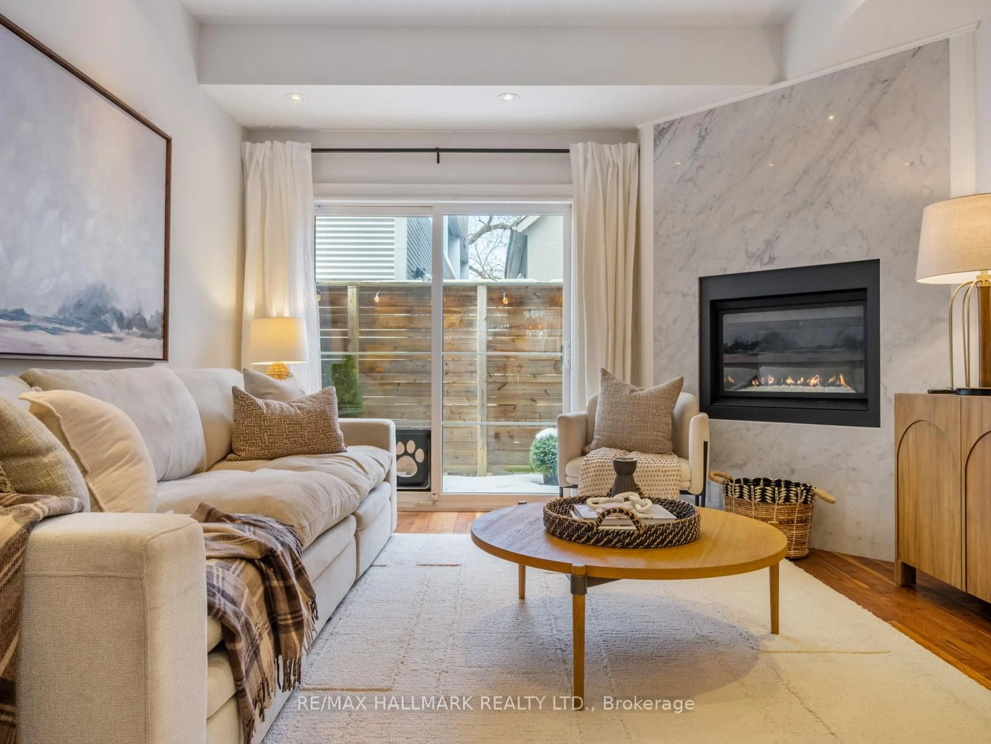 Living room with furniture, ceramic/tile floor for 246B Scarborough Rd, Toronto Ontario M4E 3M8