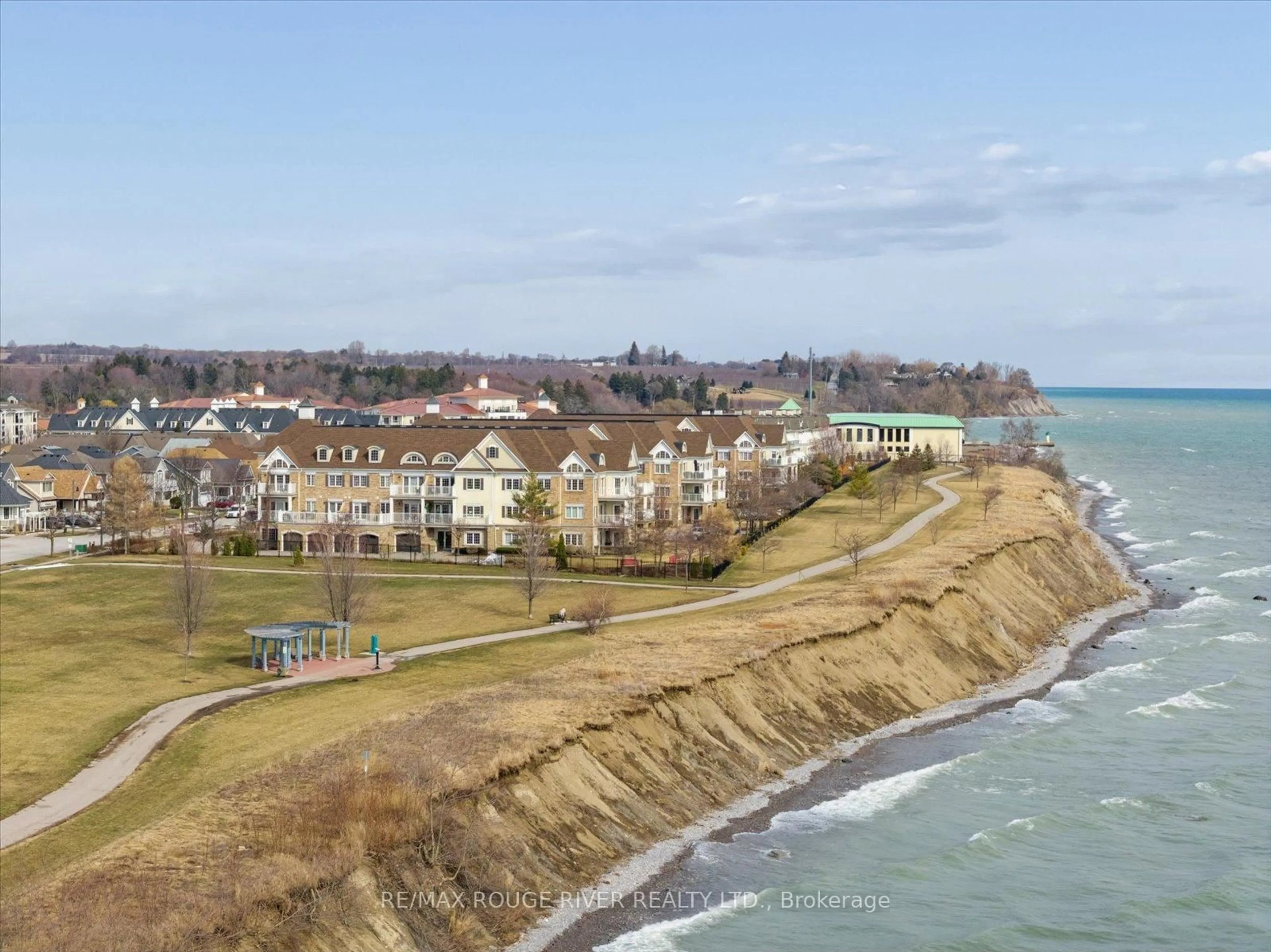 A pic from outside/outdoor area/front of a property/back of a property/a pic from drone, water/lake/river/ocean view for 395 Lakebreeze Dr #306, Clarington Ontario L1B 0A5