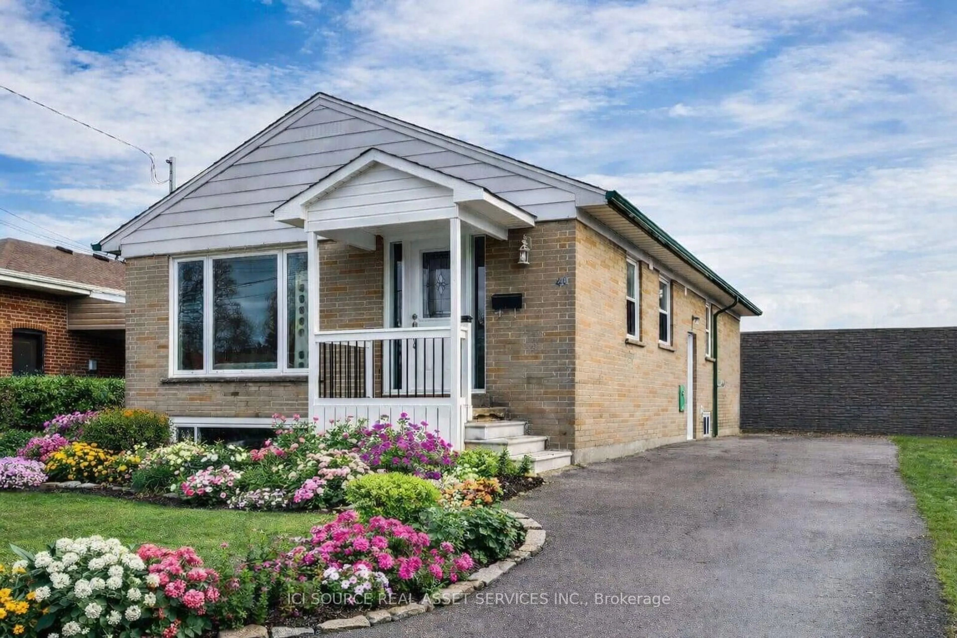Home with brick exterior material, street for 41 Wishing Well Dr, Toronto Ontario M1T 1H9