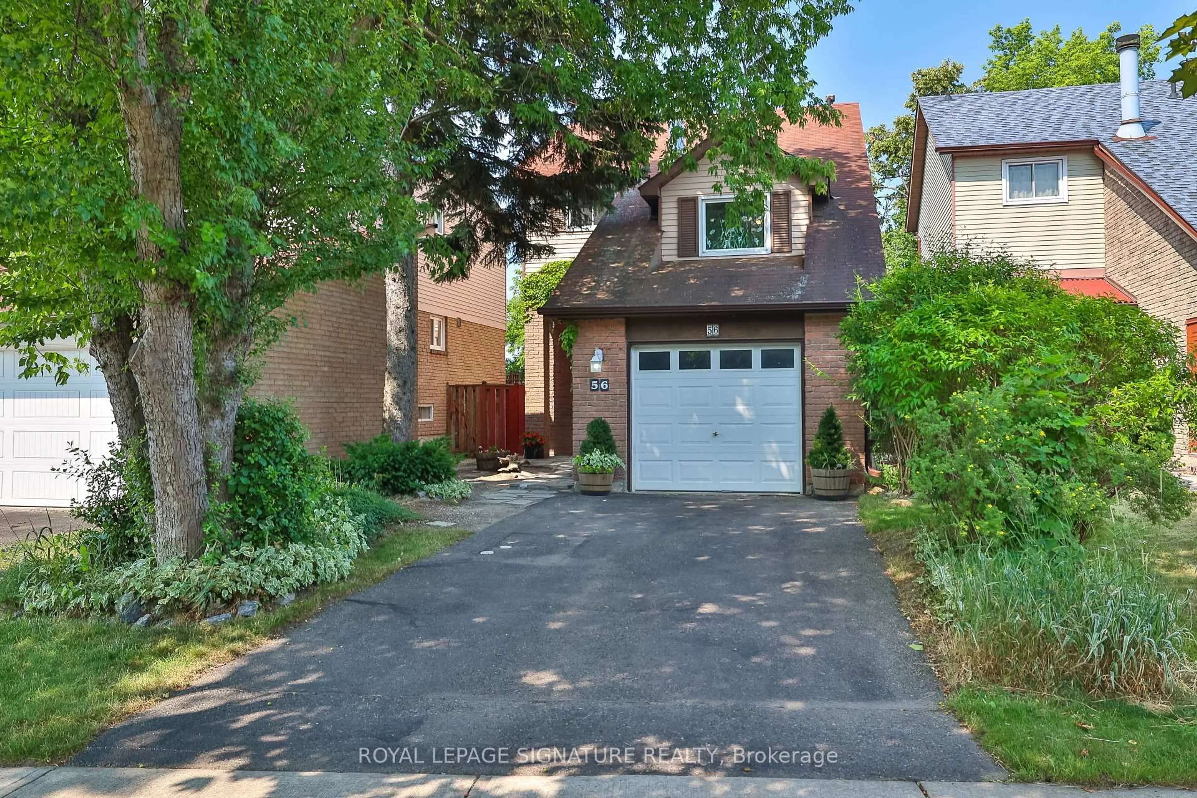 Home with brick exterior material, street for 56 Muirlands Dr, Toronto Ontario M1V 2B4