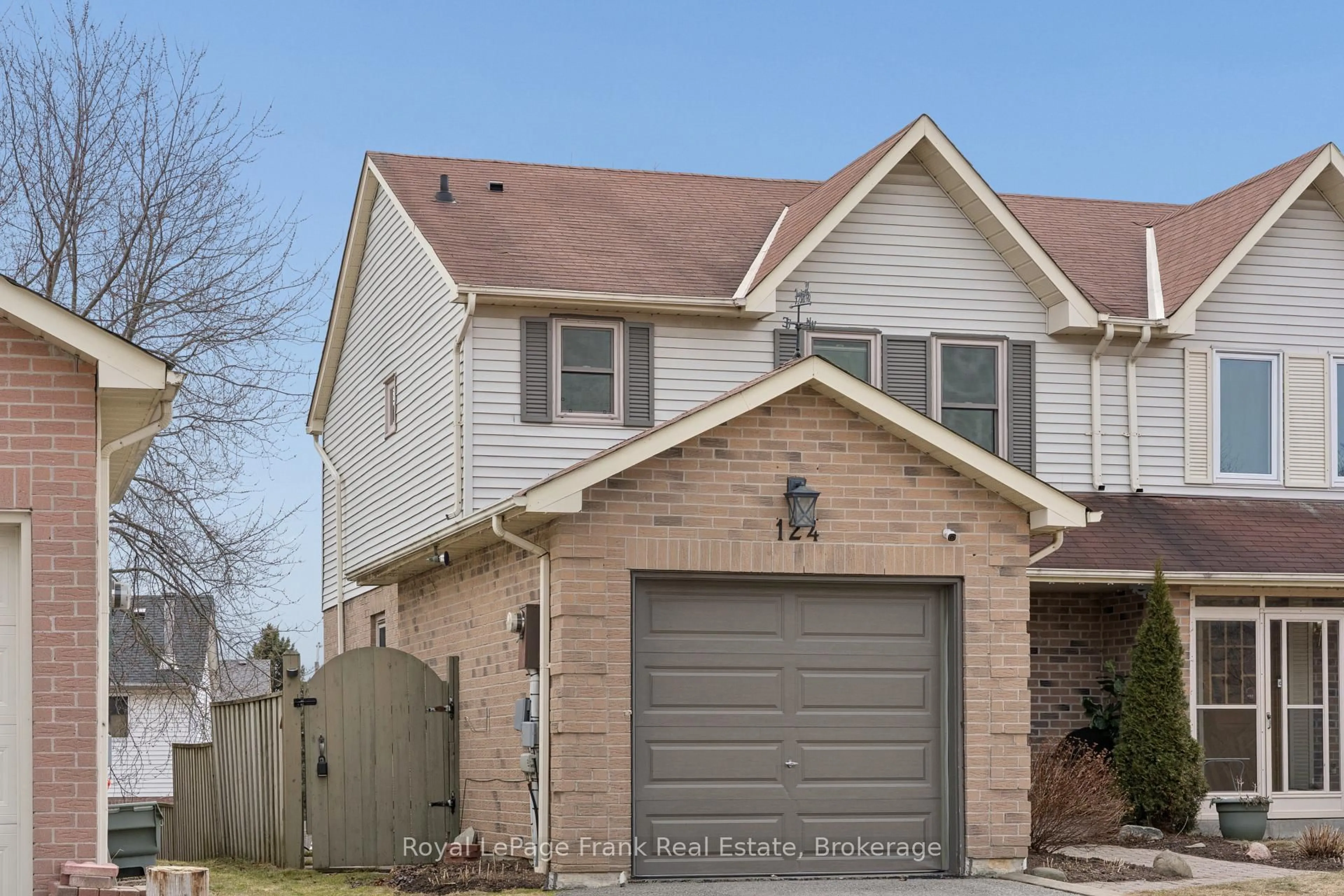 Home with brick exterior material, street for 124 Humphrey Dr, Ajax Ontario L1S 4Y7