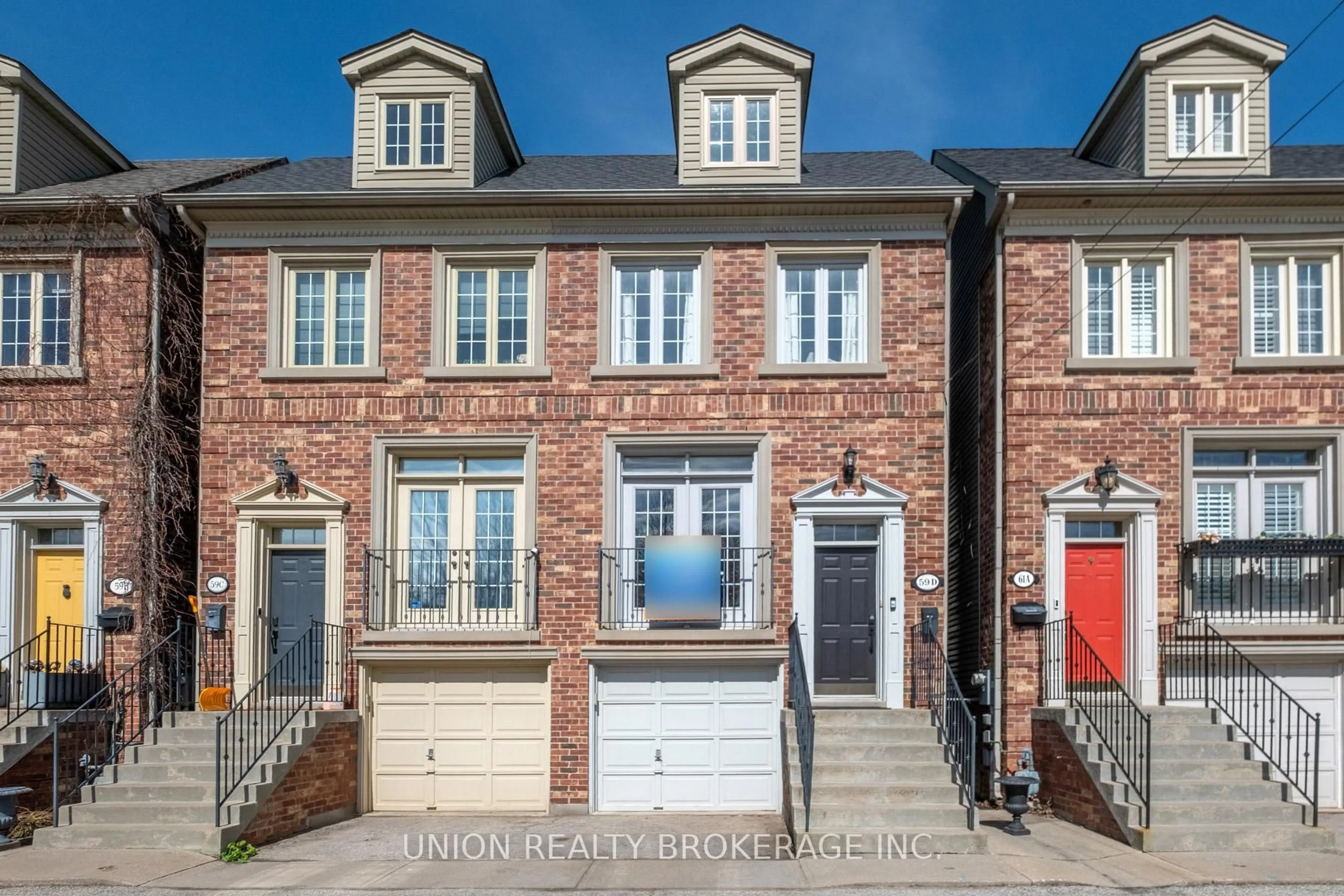 Home with brick exterior material, street for 59D Woodbine Ave, Toronto Ontario M4L 3P1
