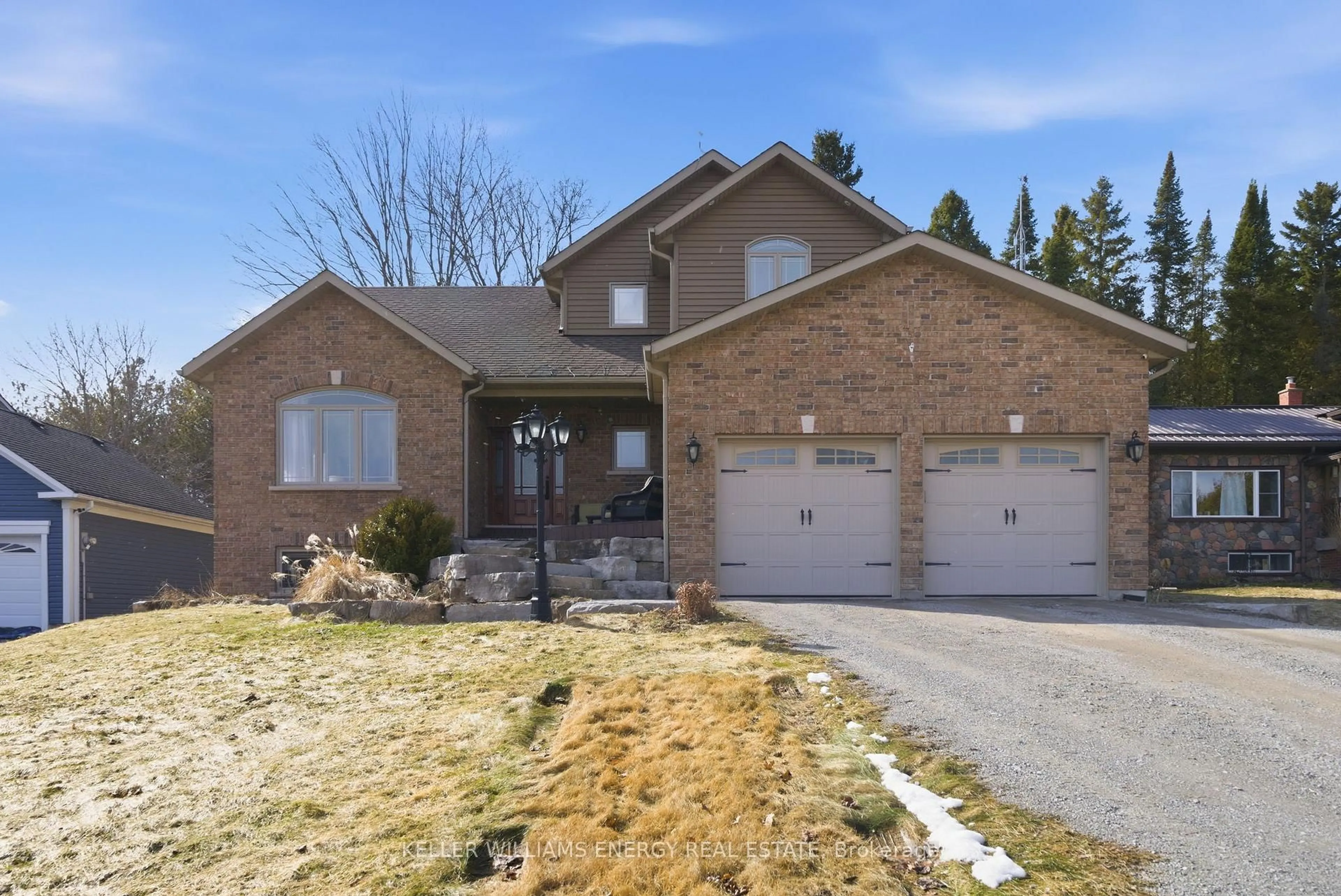 Home with brick exterior material, street for 332 Carnegie Beach Rd, Scugog Ontario L9L 1B6