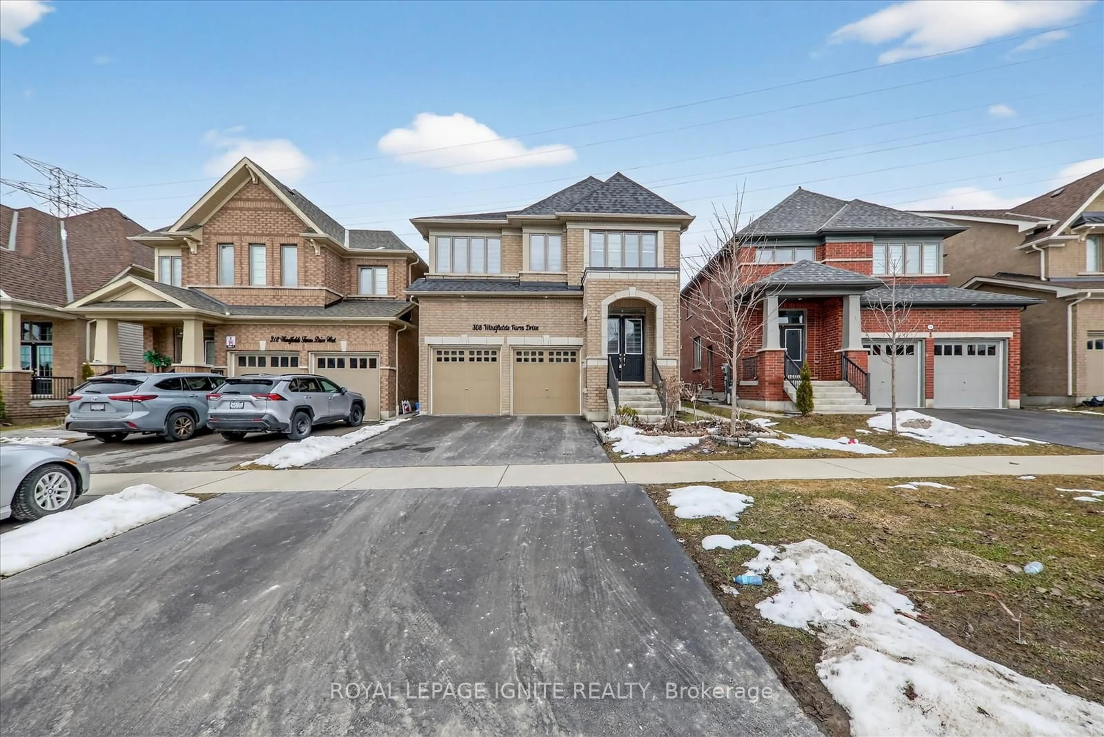 Home with brick exterior material, street for 308 Windfields Farm Dr, Oshawa Ontario L1L 0M3
