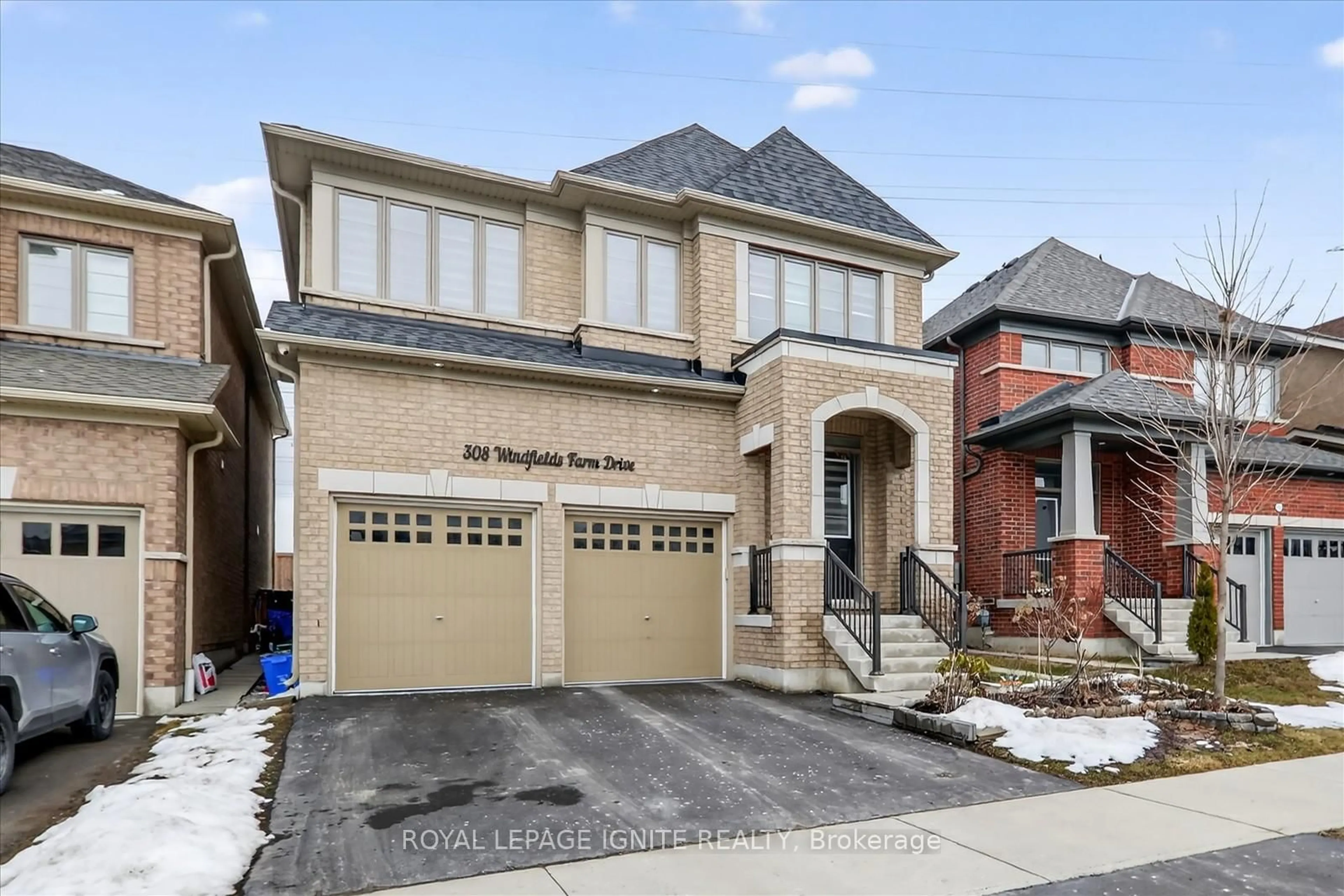 Home with brick exterior material, street for 308 Windfields Farm Dr, Oshawa Ontario L1L 0M3