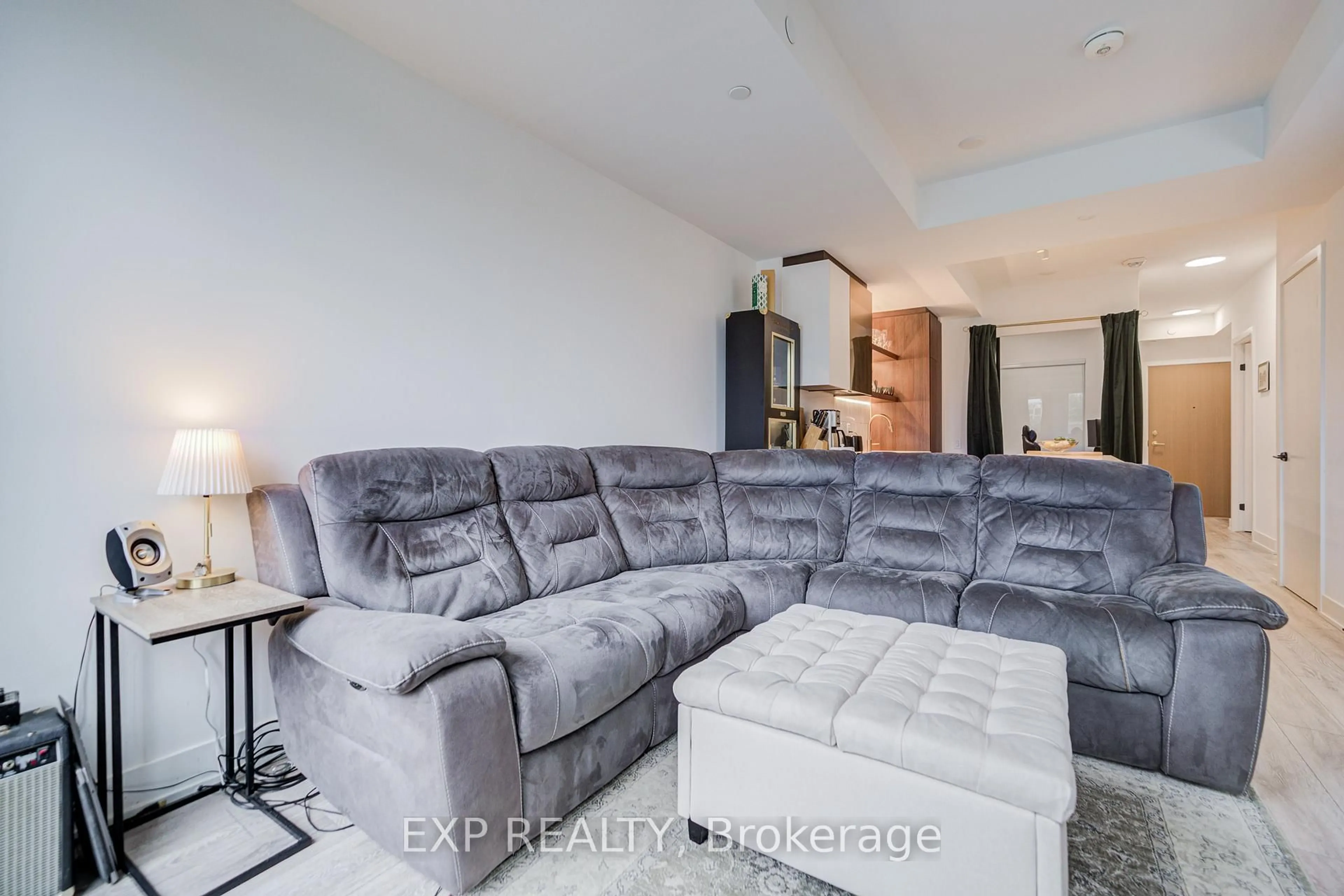 Living room with furniture, unknown for 1285 Queen St #211, Toronto Ontario M4L 1C2