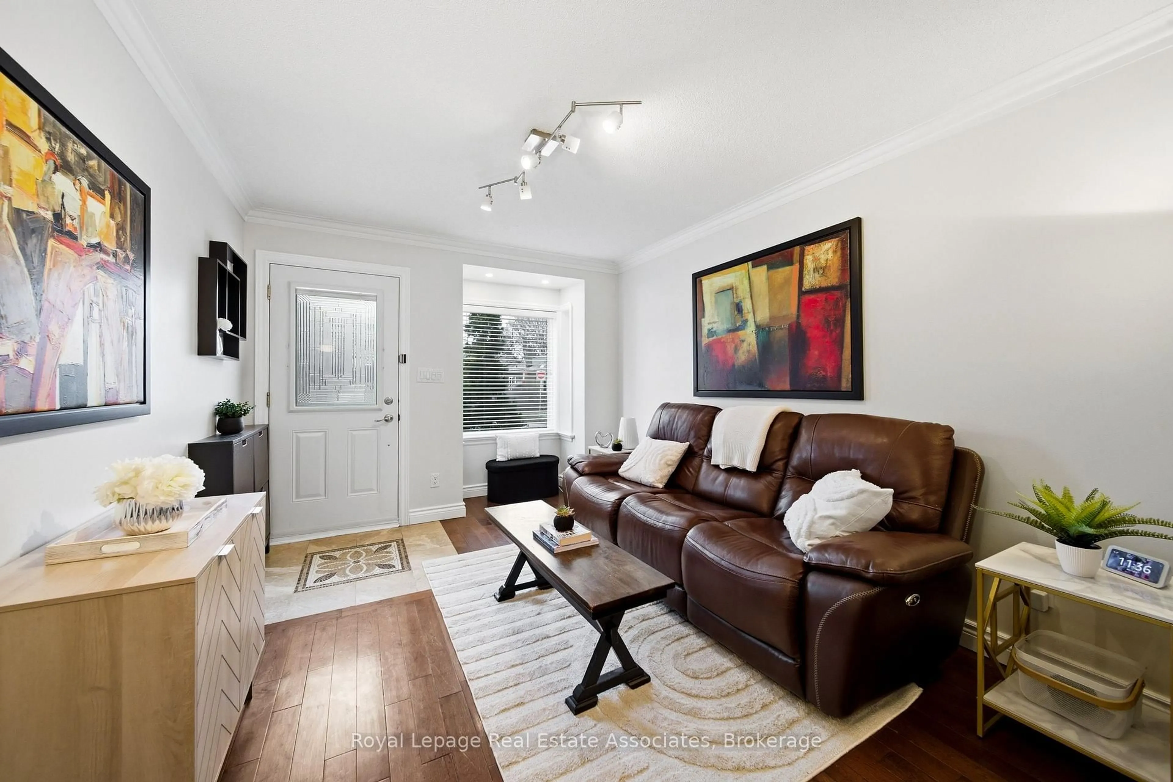 Living room with furniture, wood/laminate floor for 177 CHISHOLM Ave, Toronto Ontario M4C 4V9