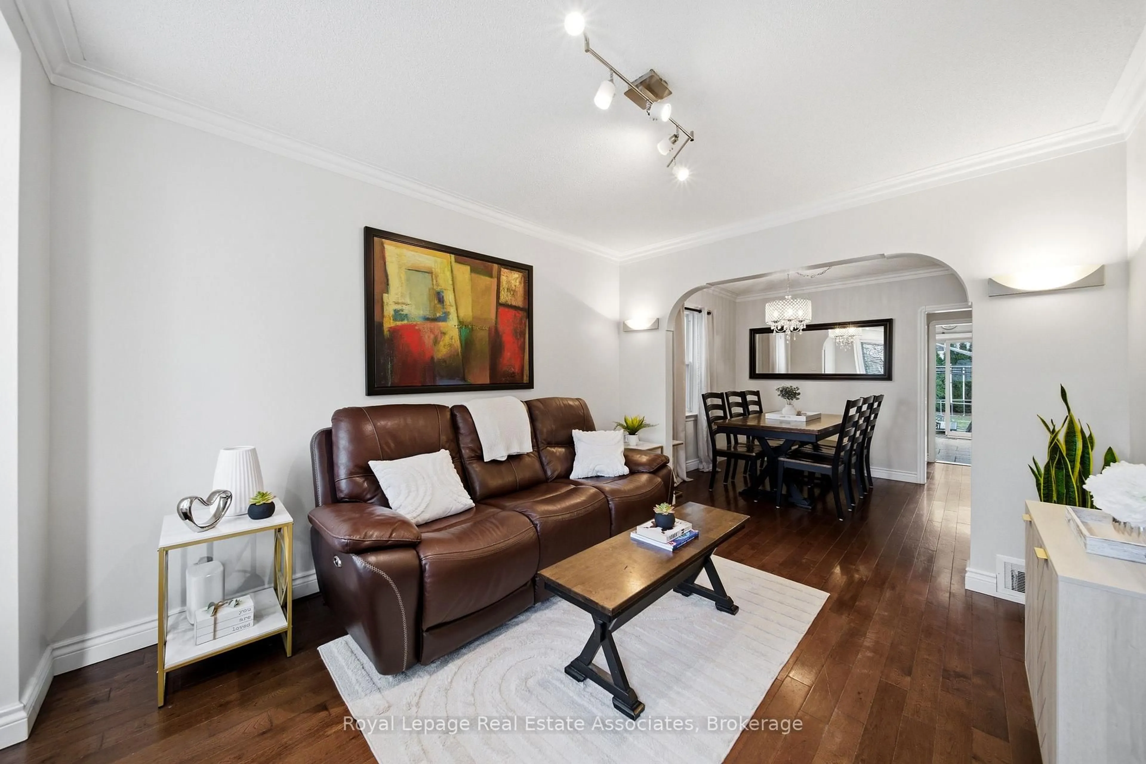 Living room with furniture, wood/laminate floor for 177 CHISHOLM Ave, Toronto Ontario M4C 4V9