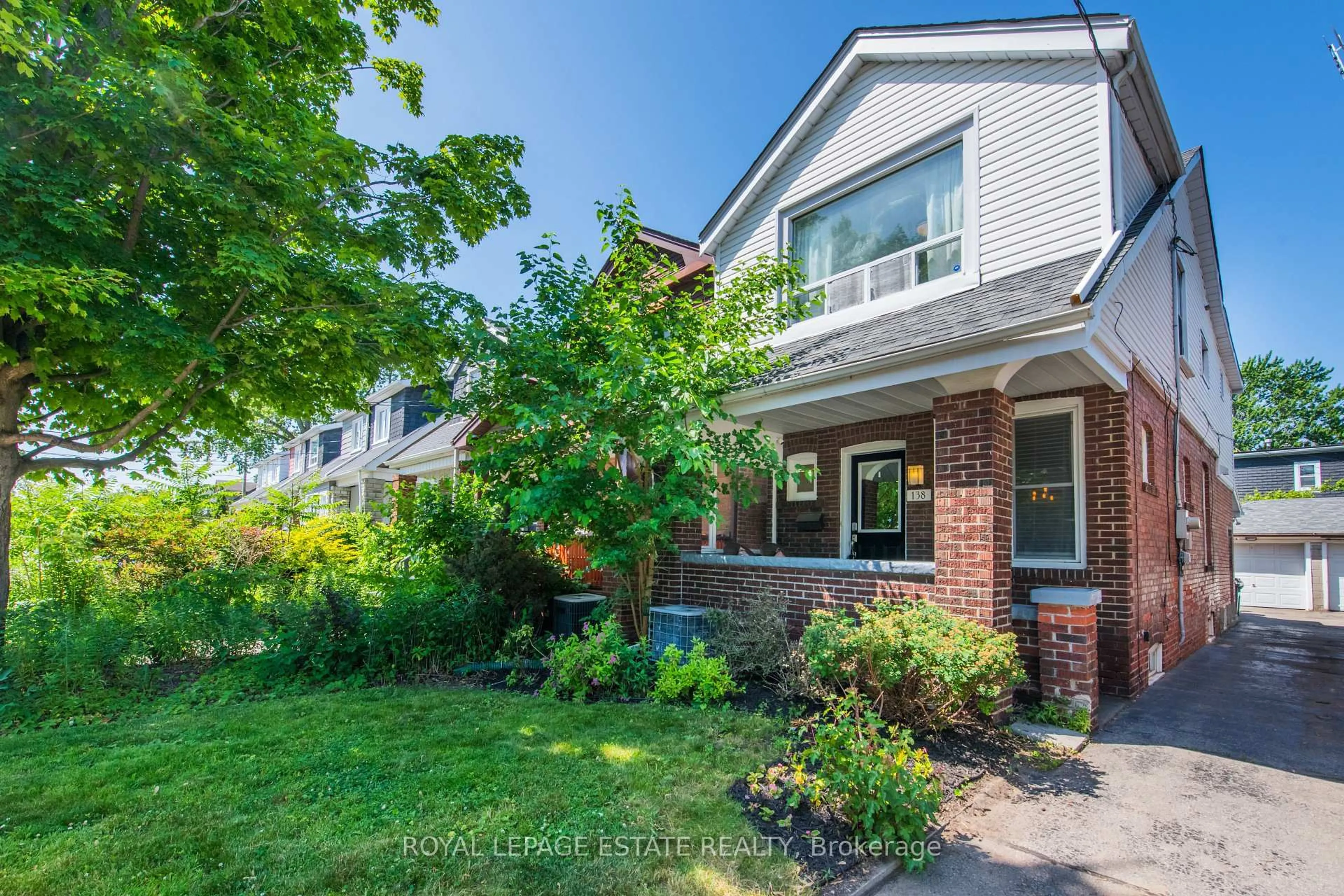 Home with brick exterior material, street for 138 Woodmount Ave, Toronto Ontario M4C 3Y8