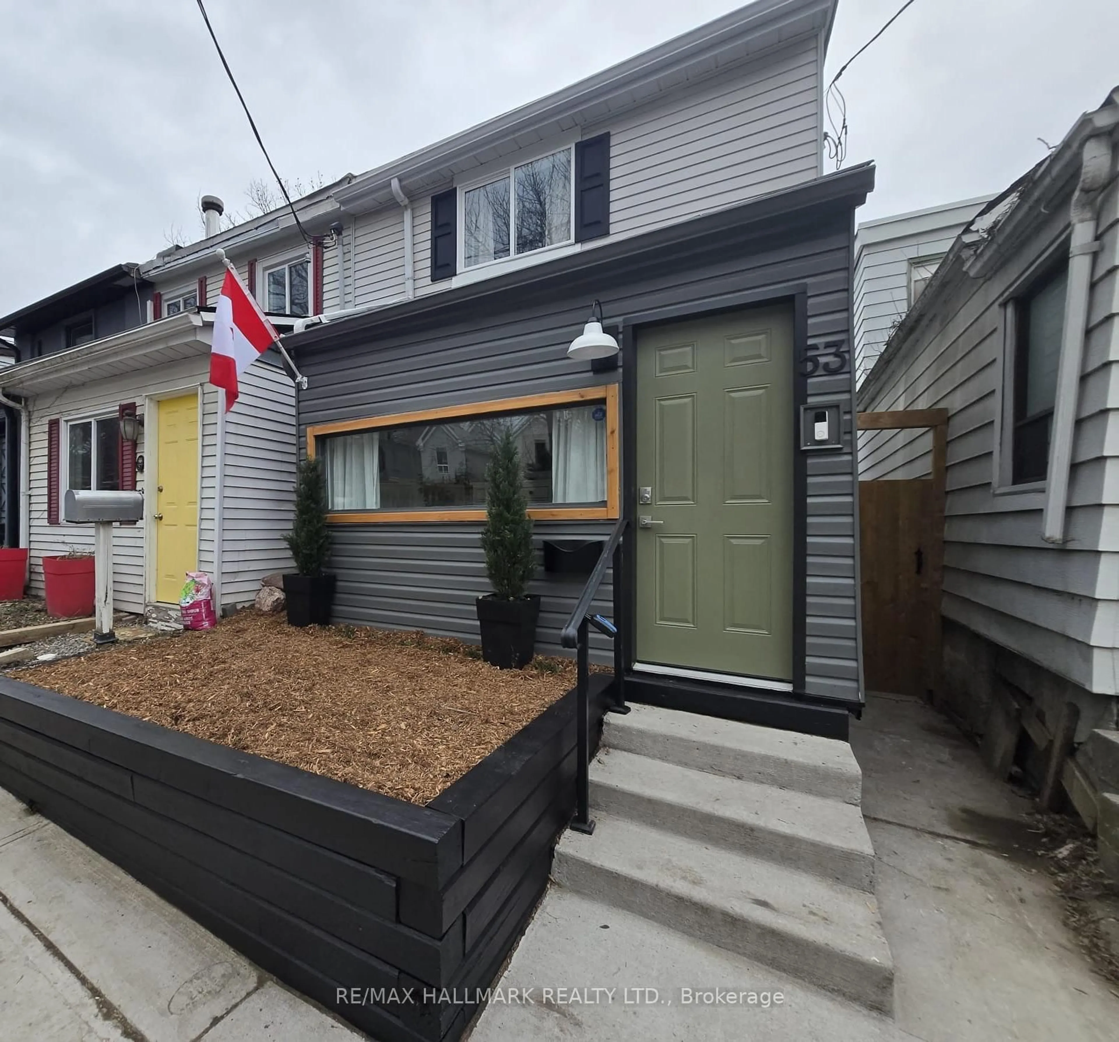 Home with vinyl exterior material, street for 53 Craven Rd, Toronto Ontario M4L 2Z4