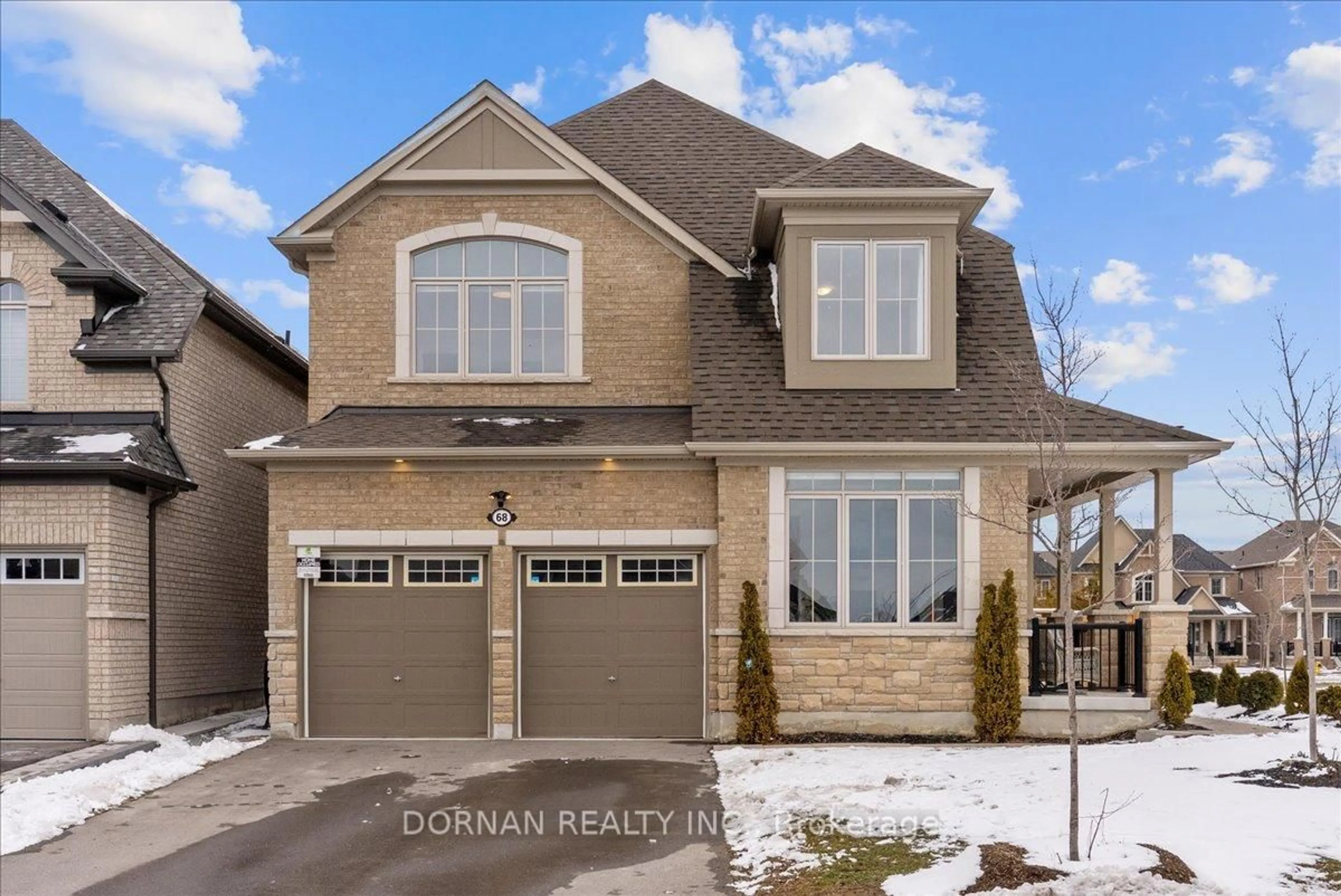 Home with brick exterior material, street for 68 Olerud Dr, Whitby Ontario L1P 0J1