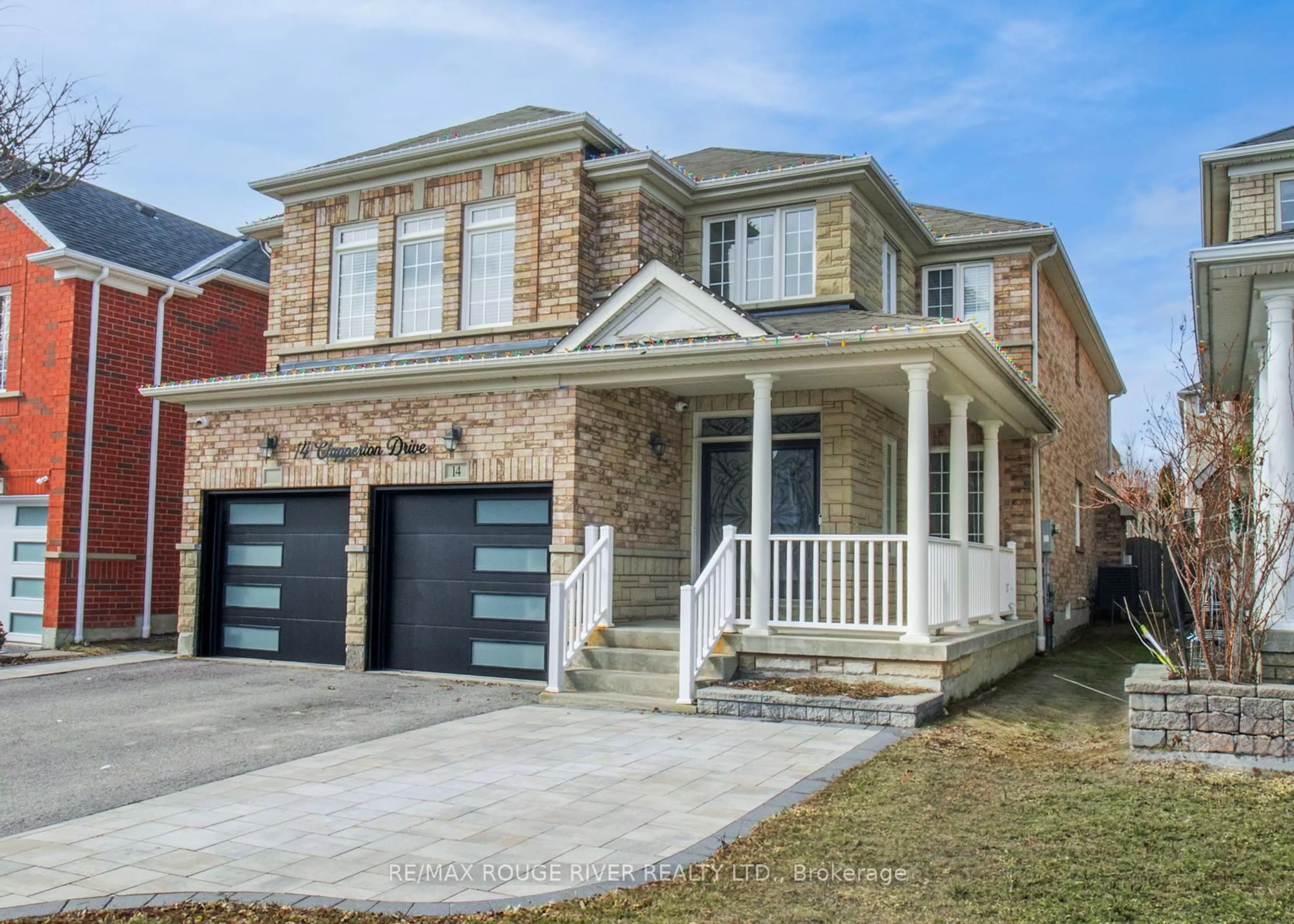 Home with brick exterior material, street for 14 Clapperton Dr, Ajax Ontario L1T 4X9
