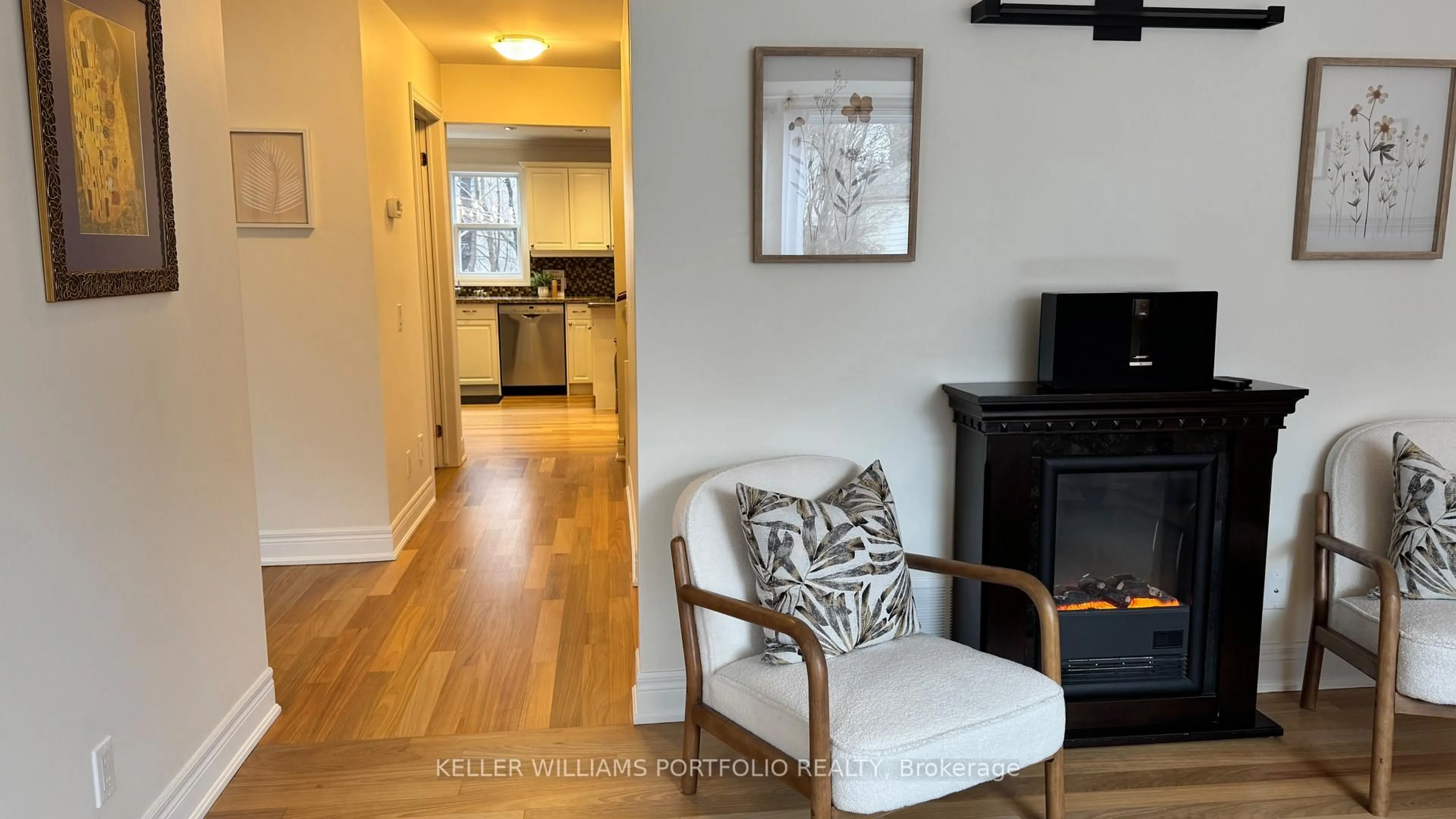Living room with furniture, wood/laminate floor for 49 Dolphin Dr, Toronto Ontario M1L 1N5