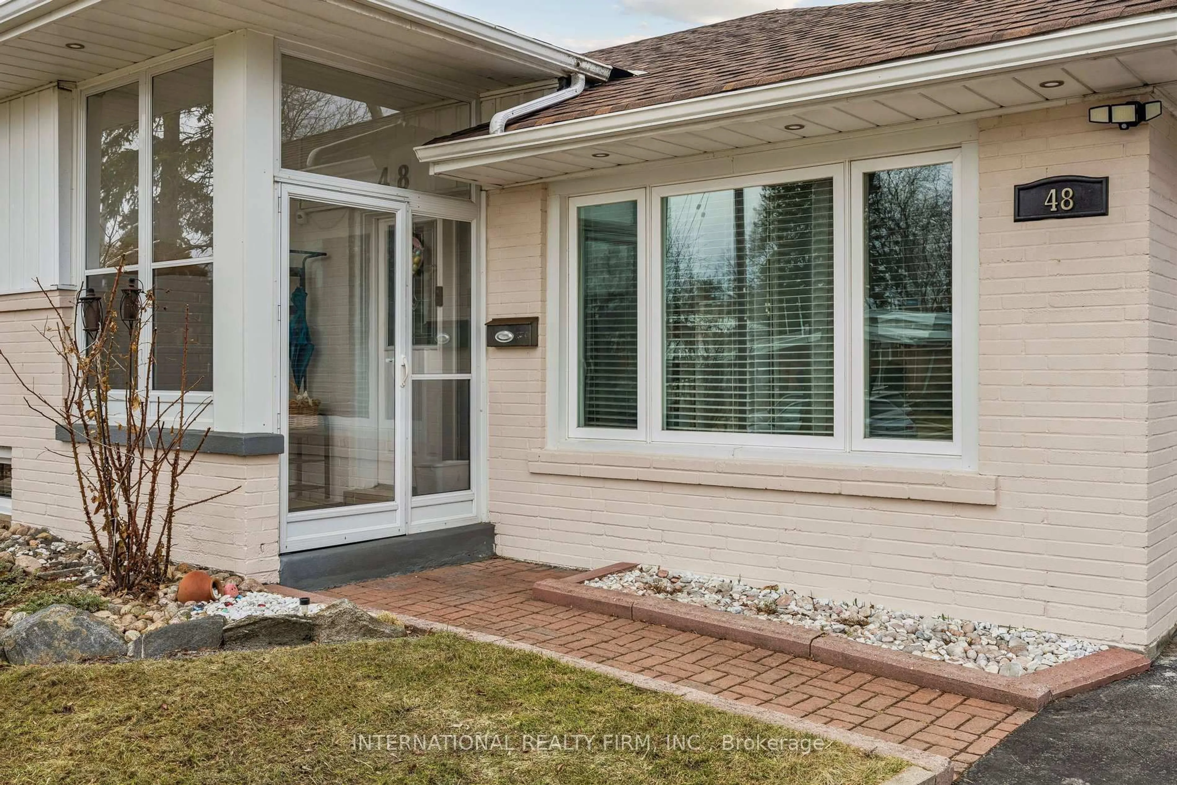 Home with brick exterior material, street for 48 Holford Cres, Toronto Ontario M1T 1M2