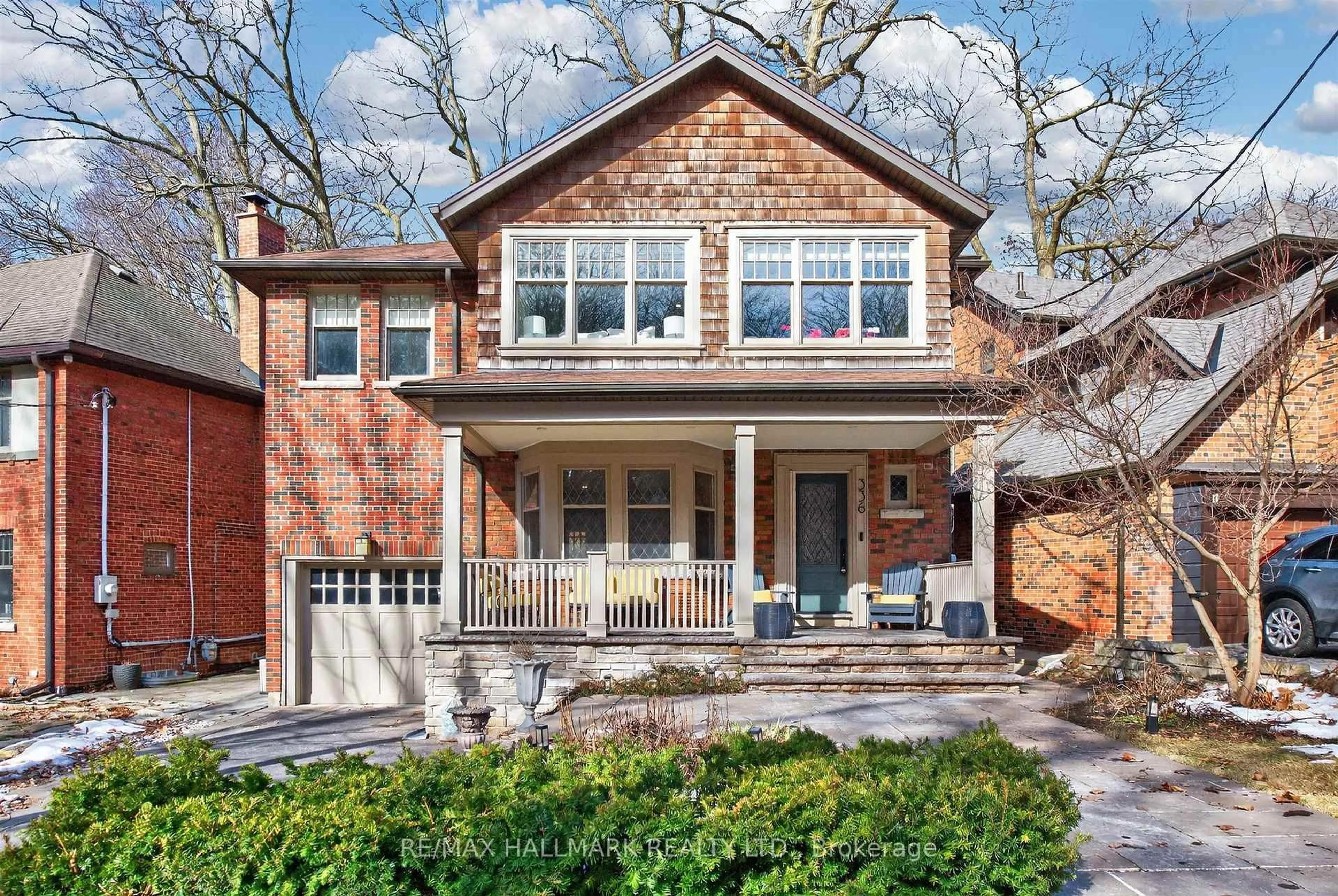 Home with brick exterior material, street for 336 Glen Manor Dr, Toronto Ontario M4E 2X7
