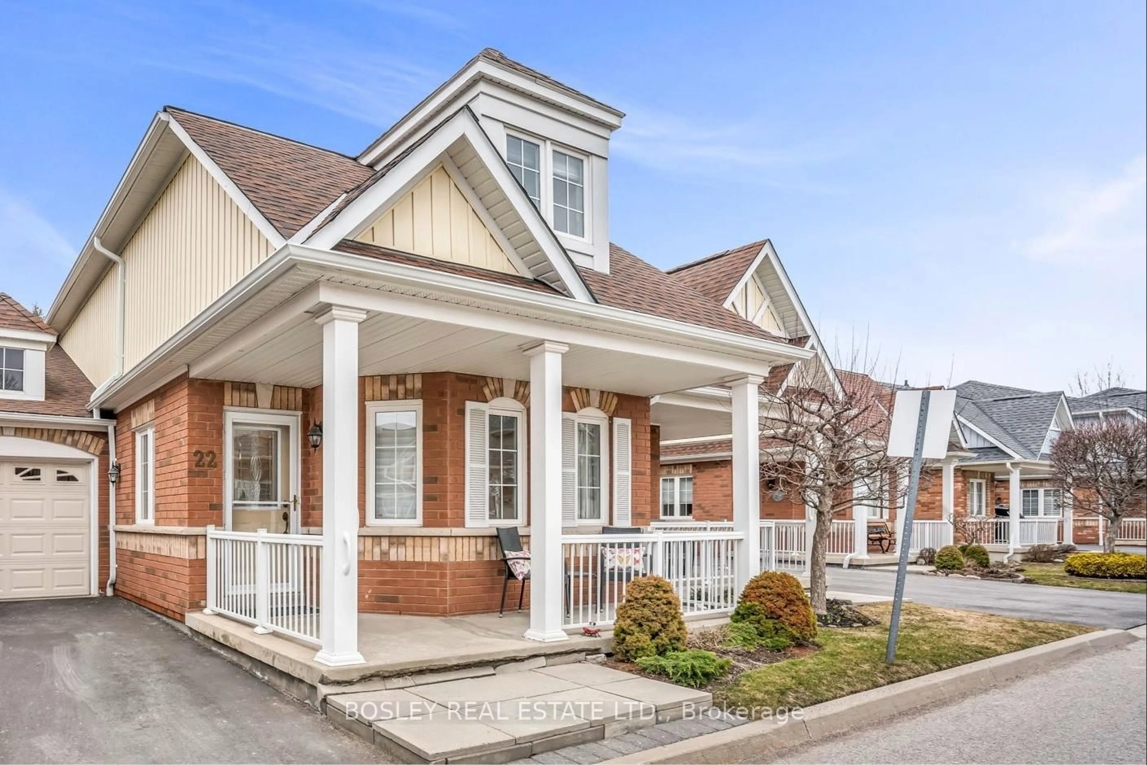 Home with brick exterior material, street for 22 Gidley Lane #24, Ajax Ontario L1T 4Z7
