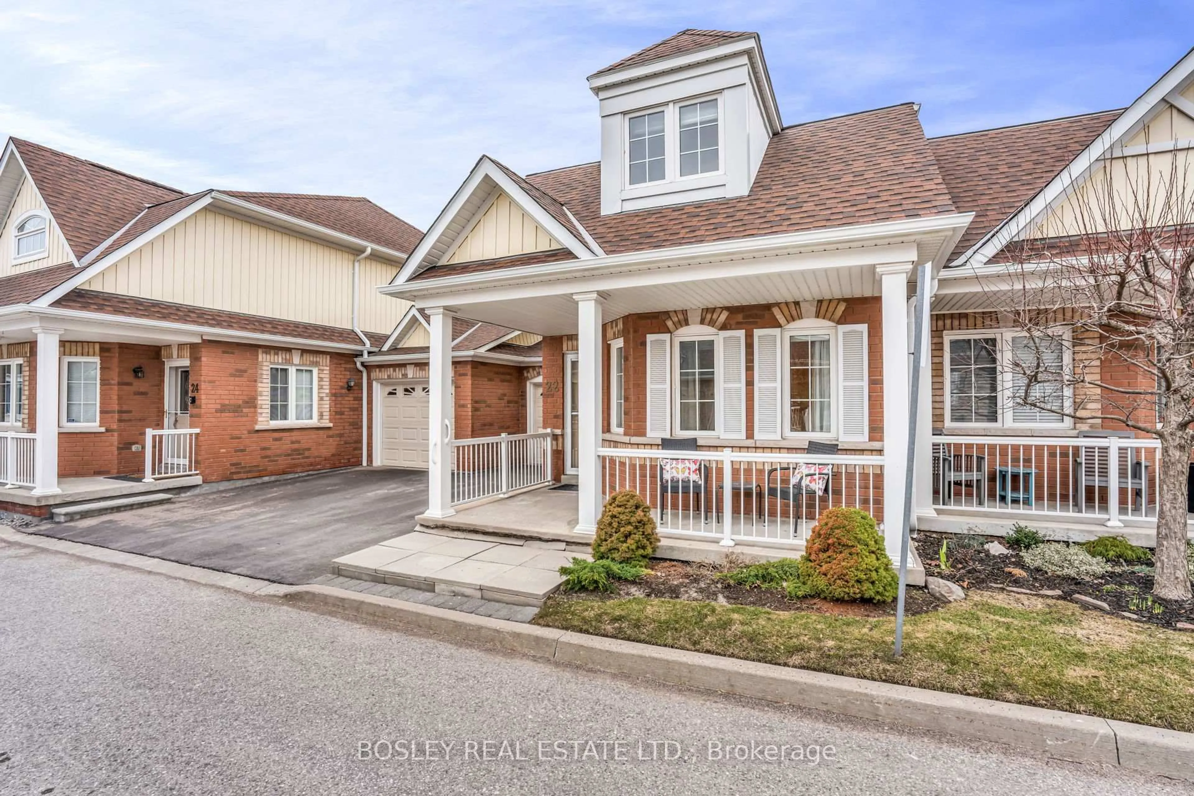 Home with brick exterior material, street for 22 Gidley Lane #24, Ajax Ontario L1T 4Z7