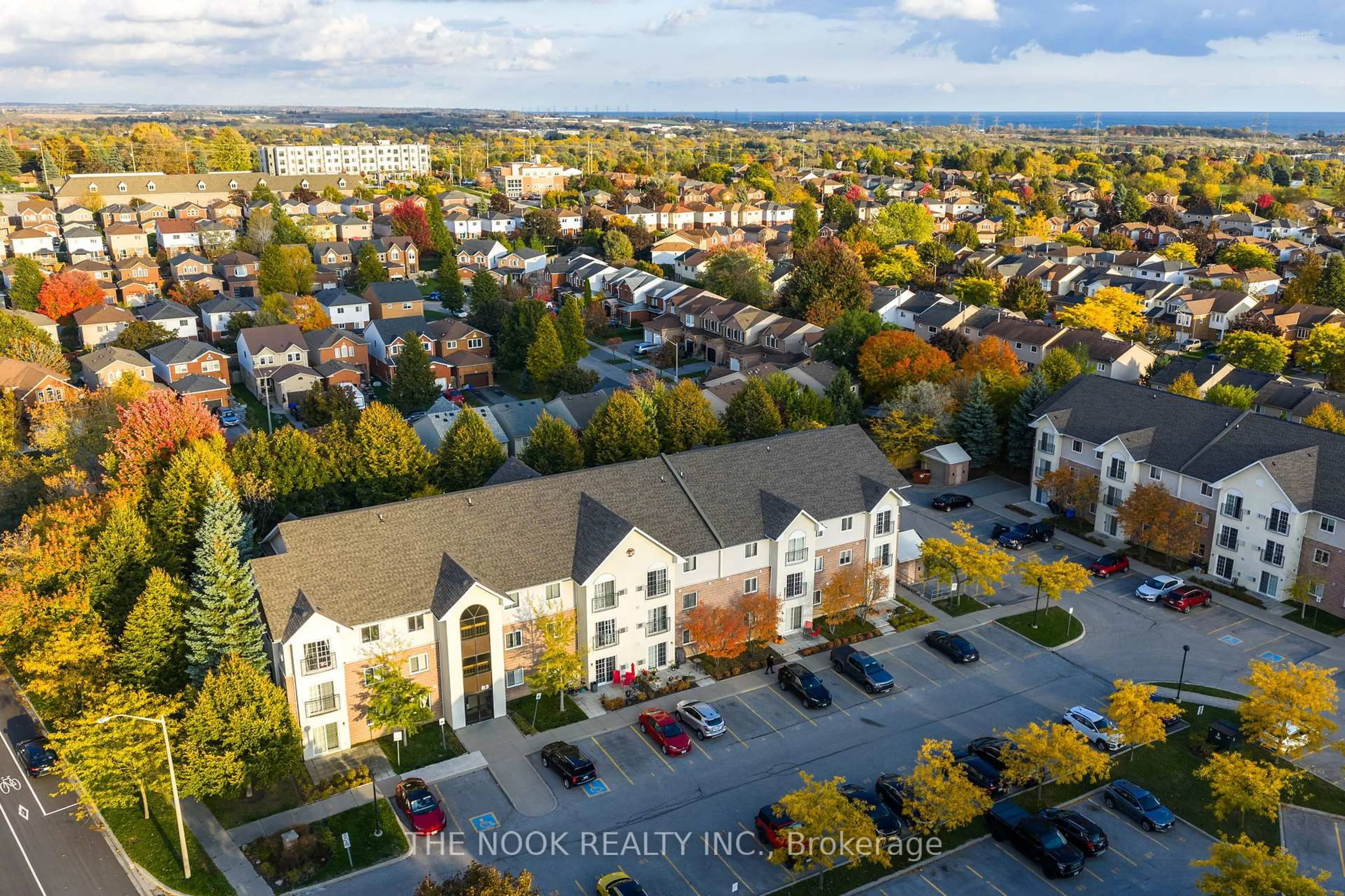 A pic from outside/outdoor area/front of a property/back of a property/a pic from drone, city buildings view from balcony for 83 Aspen Springs Dr #309, Clarington Ontario L1C 5J7