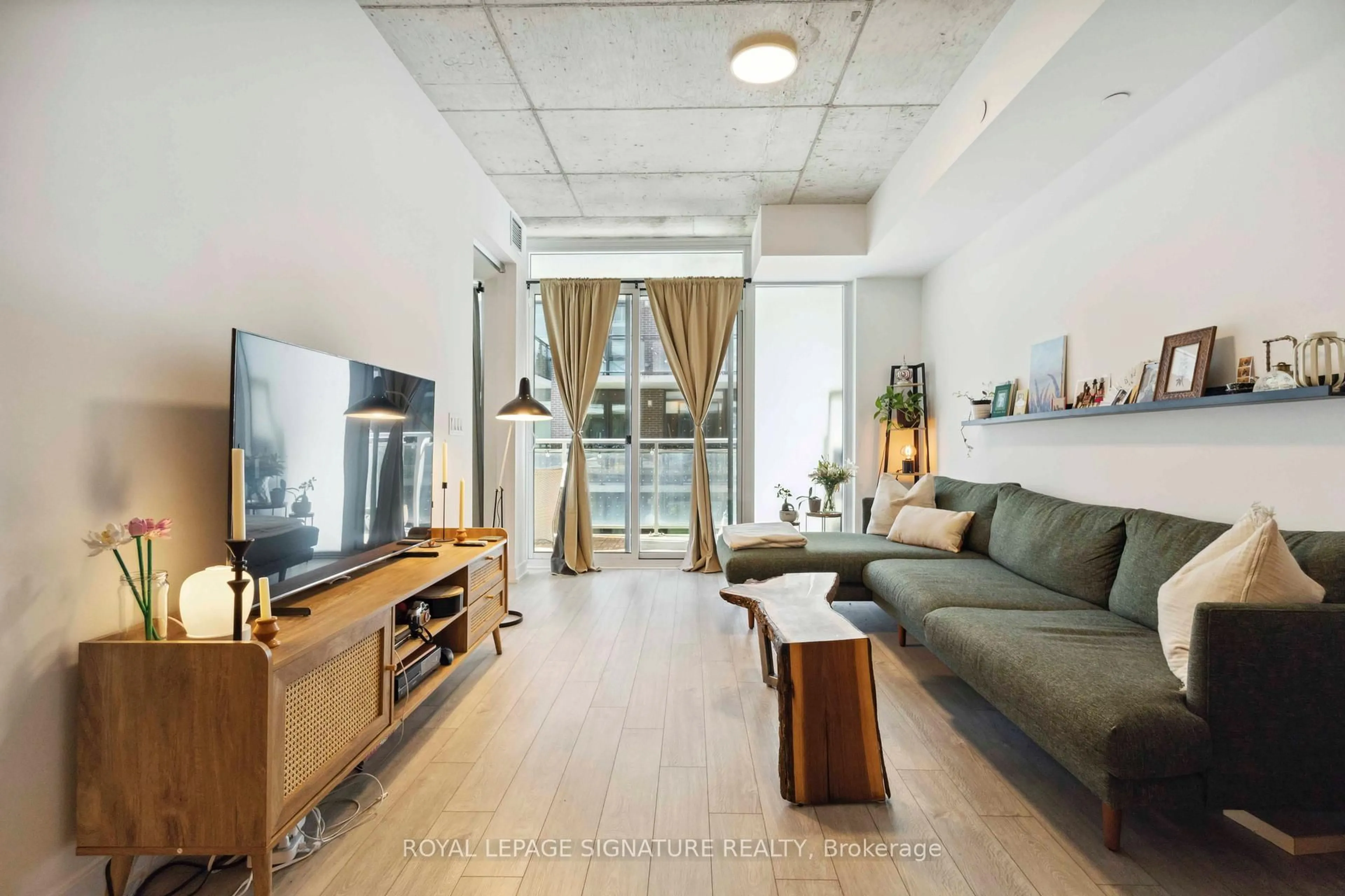 Living room with furniture, unknown for 665 Queen St #313, Toronto Ontario M4M 1G4