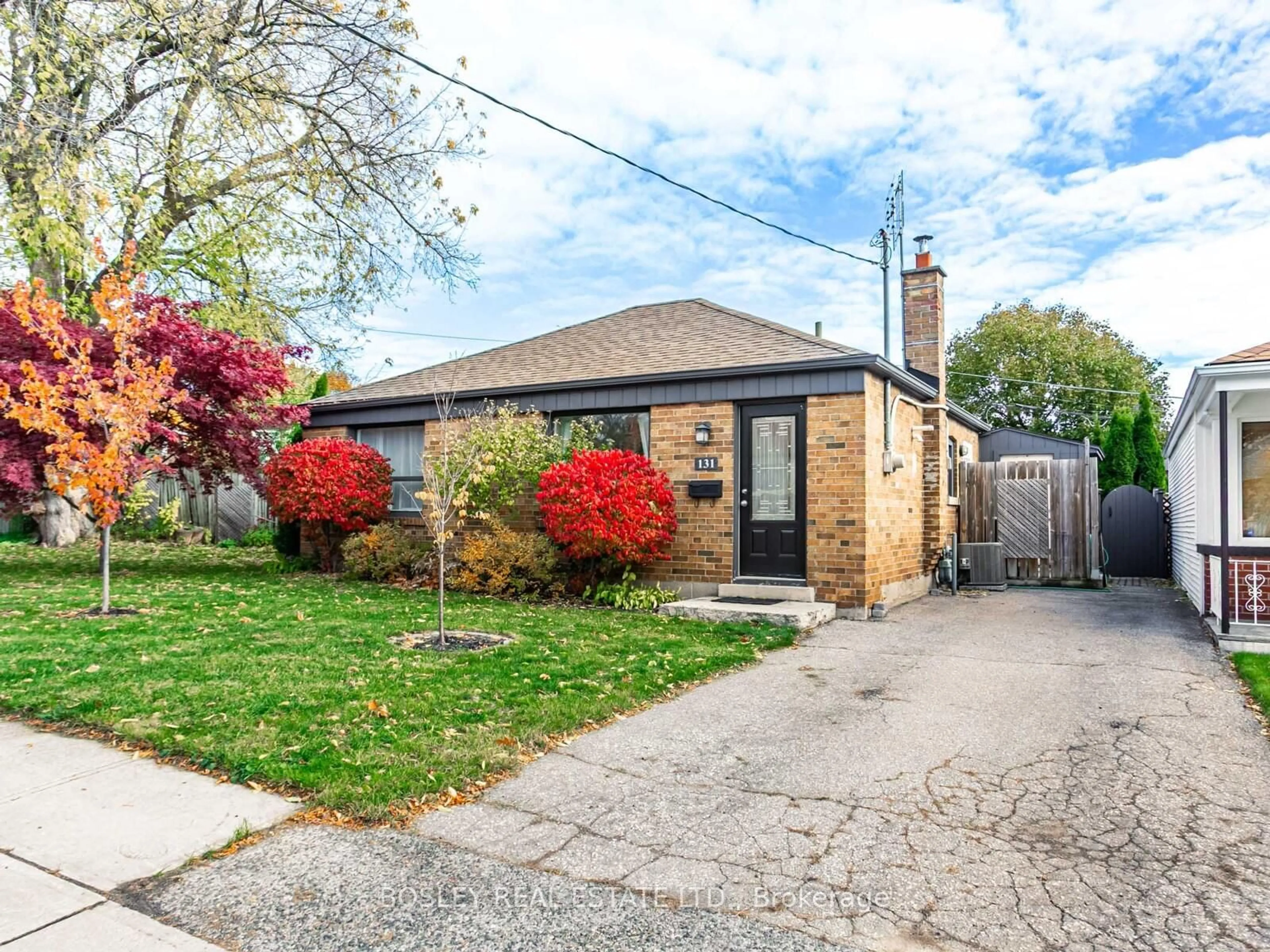 Home with brick exterior material, street for 131 Meighen Ave, Toronto Ontario M4B 2H8