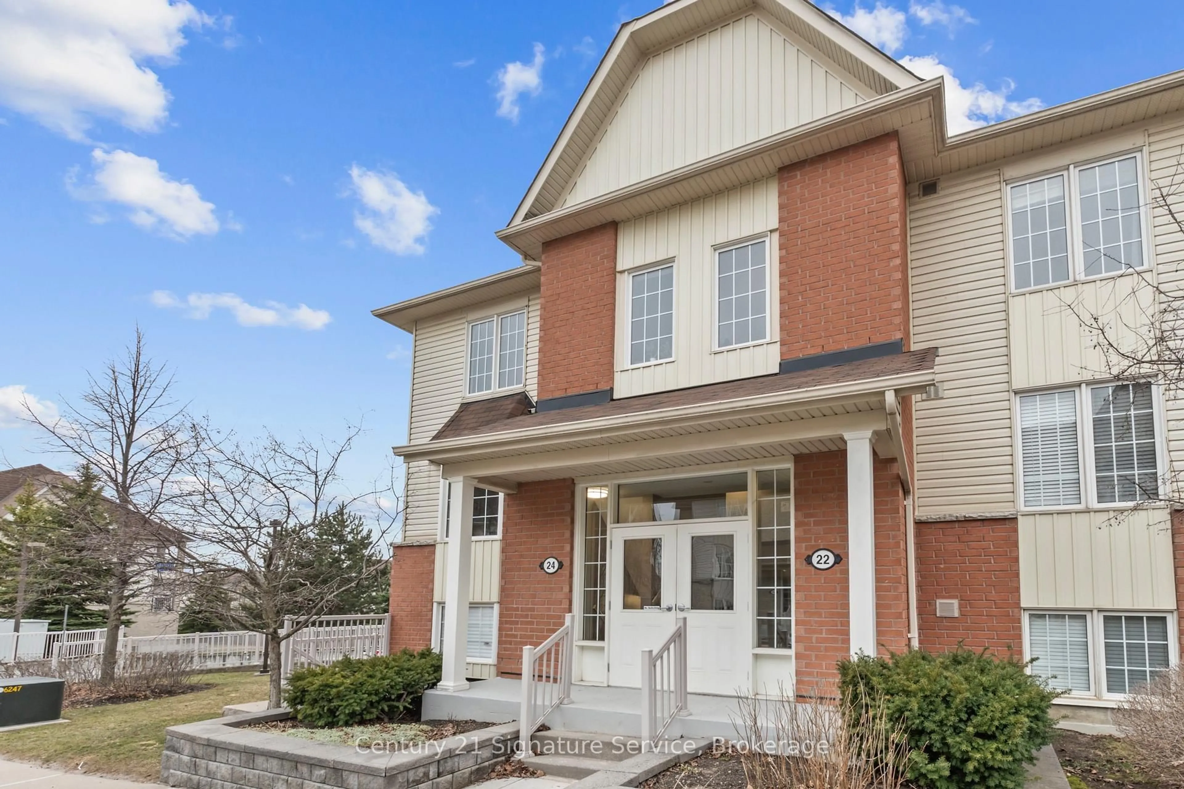 Home with brick exterior material, street for 24 Petra Way #1, Whitby Ontario L1R 0A5