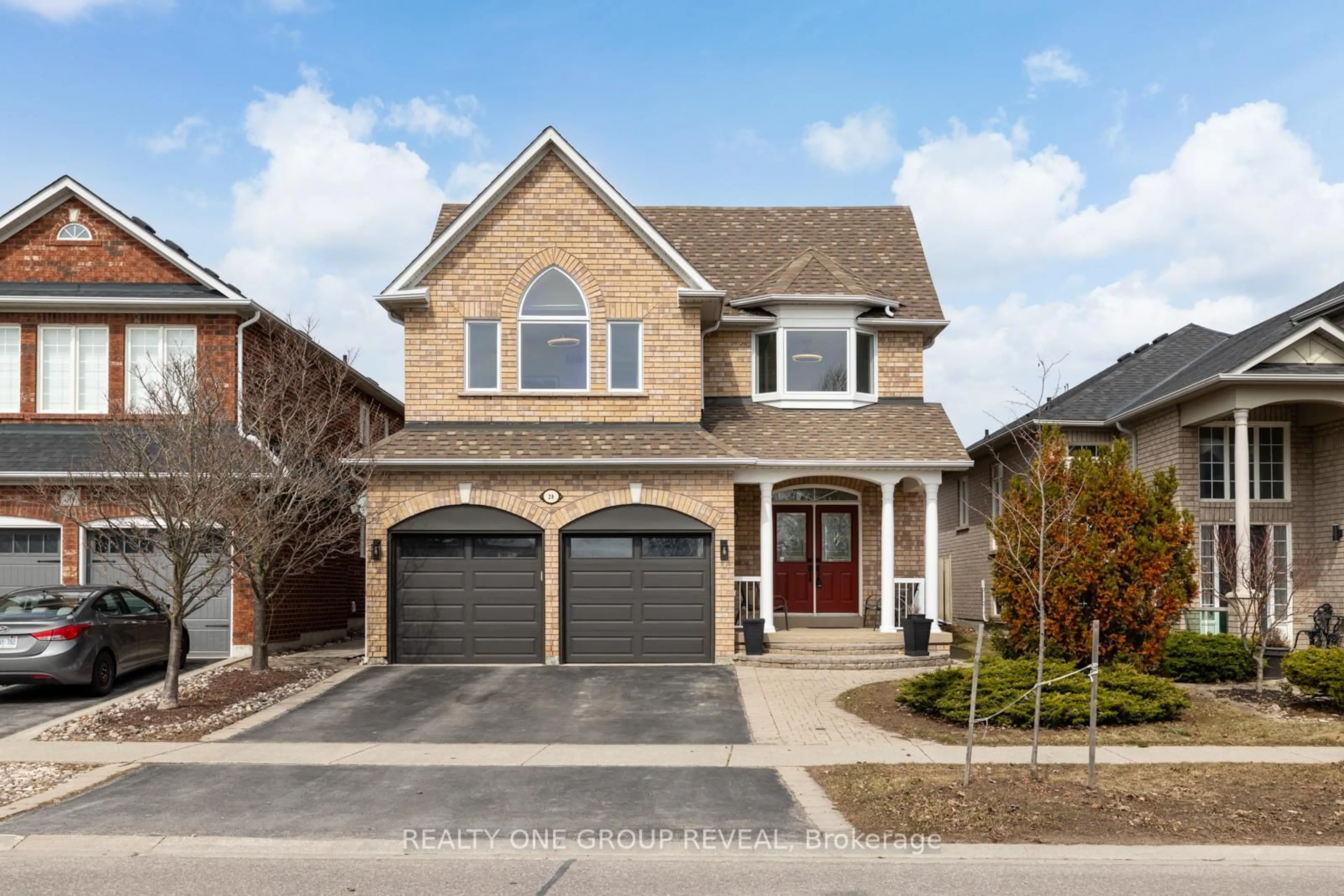 Home with brick exterior material, street for 28 Robert Attersley Dr, Whitby Ontario L1R 3B2