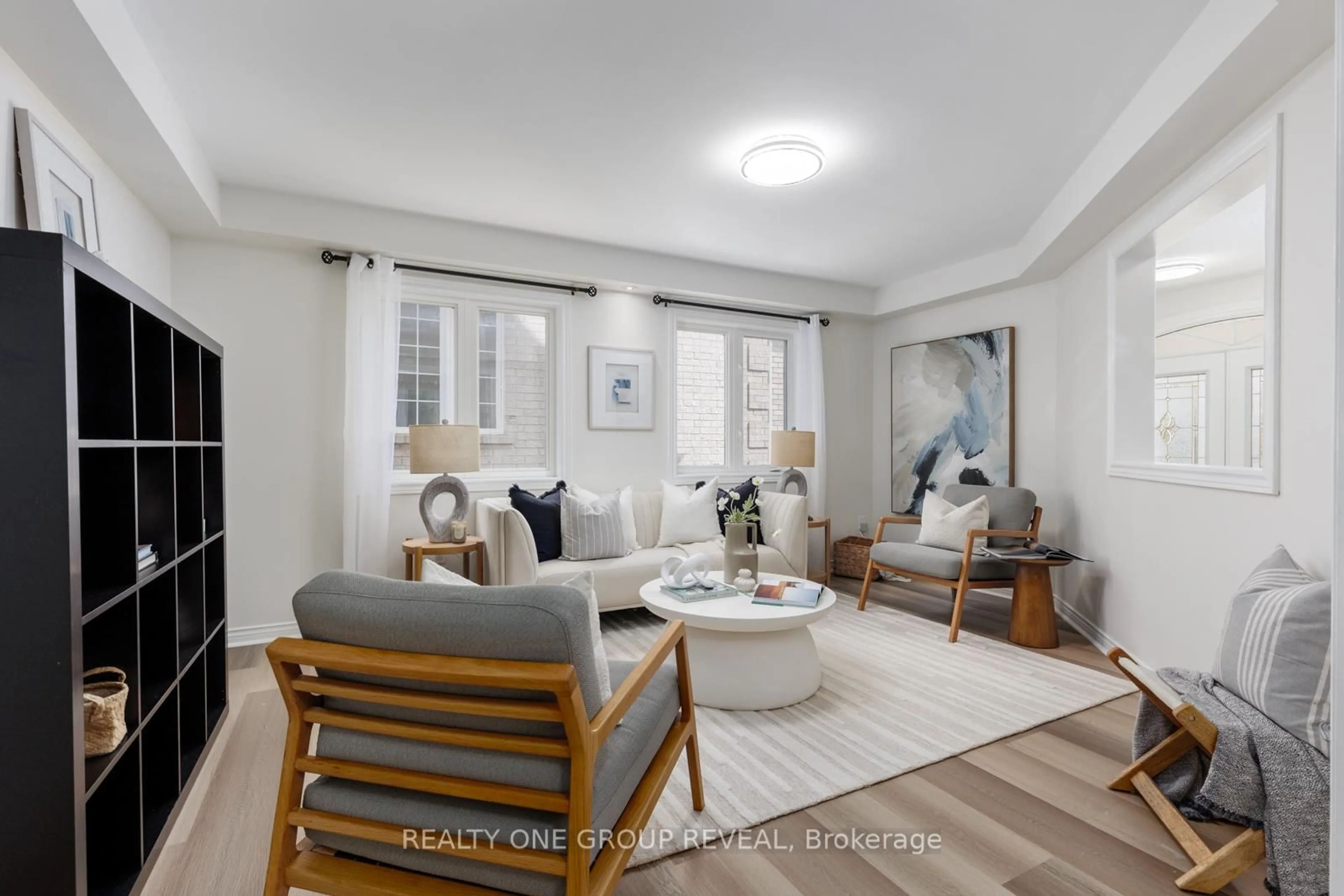 Living room with furniture, unknown for 28 Robert Attersley Dr, Whitby Ontario L1R 3B2