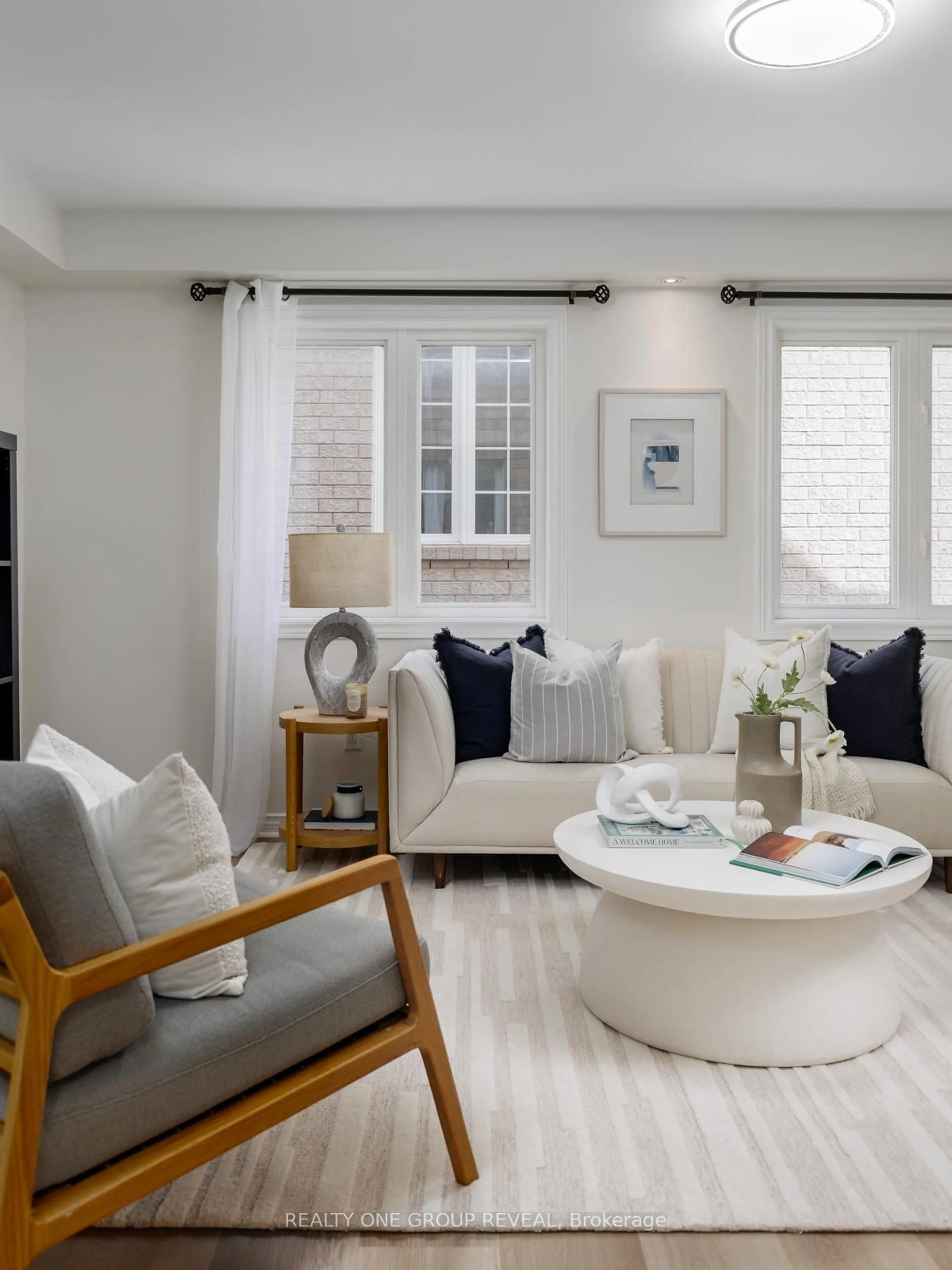 Living room with furniture, unknown for 28 Robert Attersley Dr, Whitby Ontario L1R 3B2