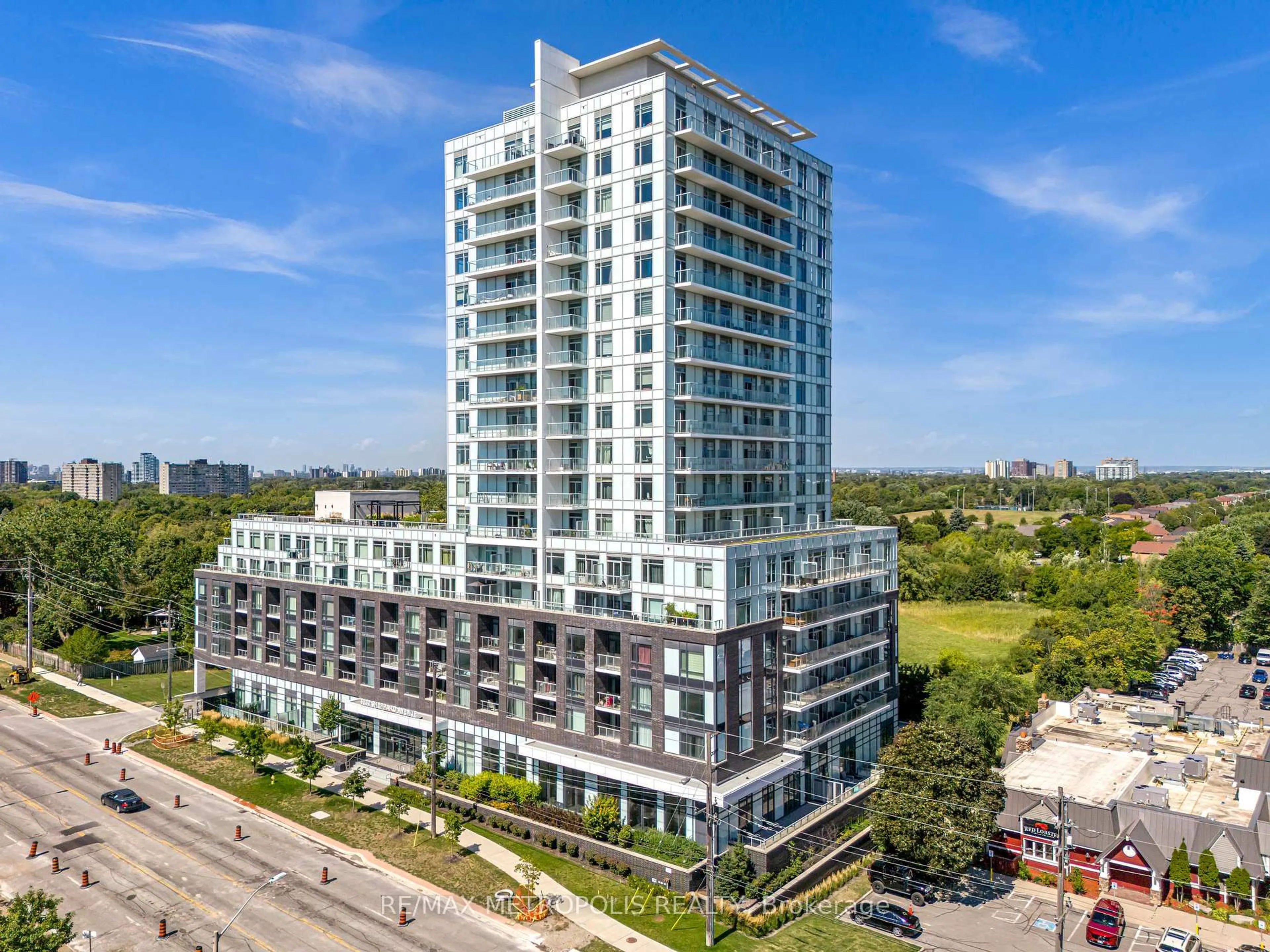 A pic from outside/outdoor area/front of a property/back of a property/a pic from drone, building for 3220 Sheppard Ave #1310, Toronto Ontario M1T 0B7