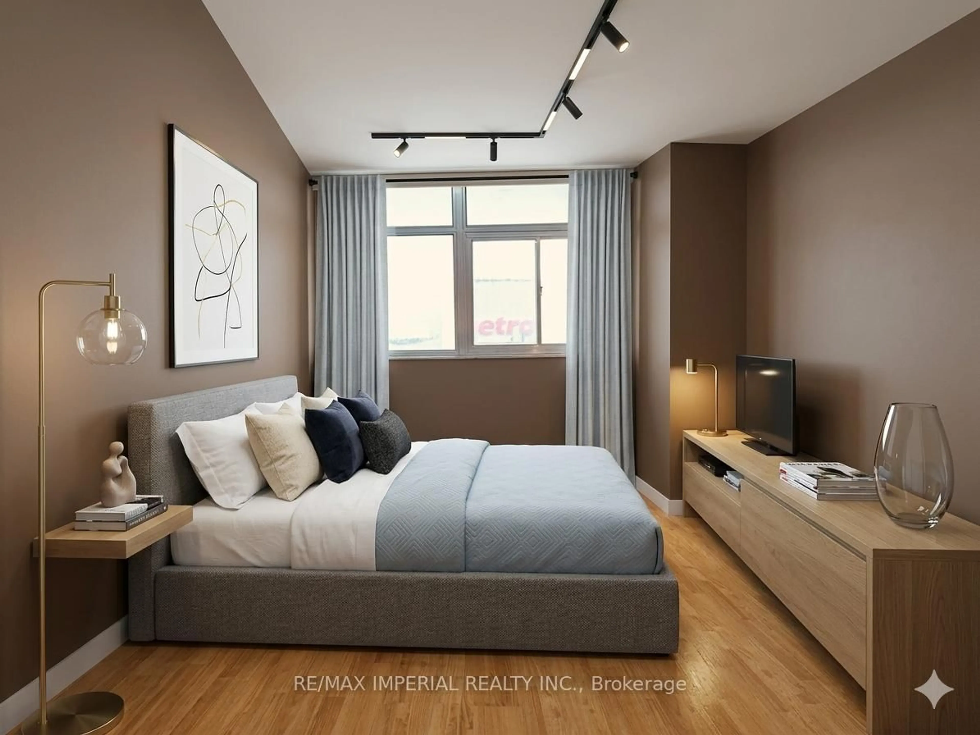 Bedroom with bed, wood/laminate floor for 3151 Bridletowne Circ #305, Toronto Ontario M1W 2T1