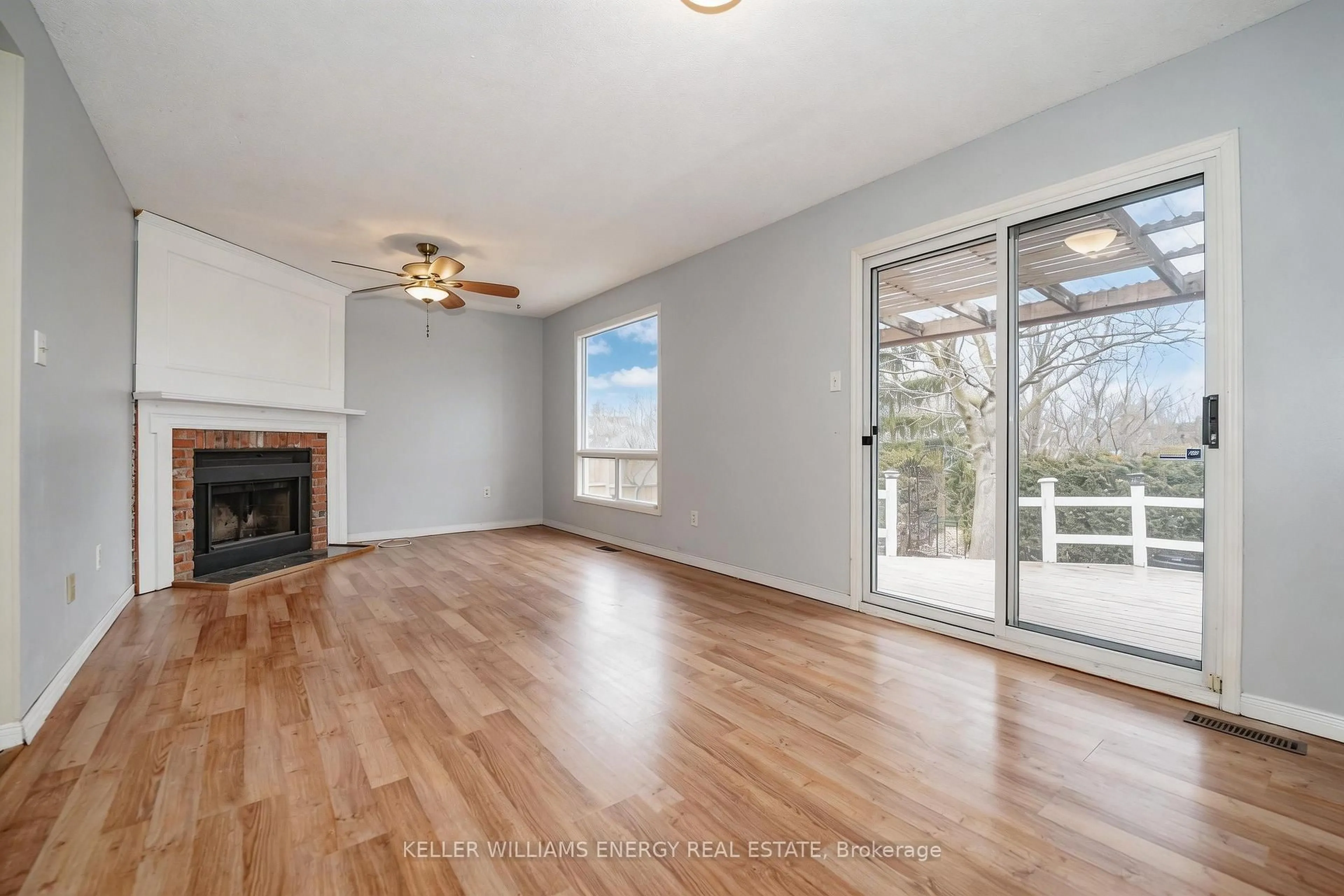 Living room with furniture, wood/laminate floor for 135 Allan St, Scugog Ontario L9L 1E4