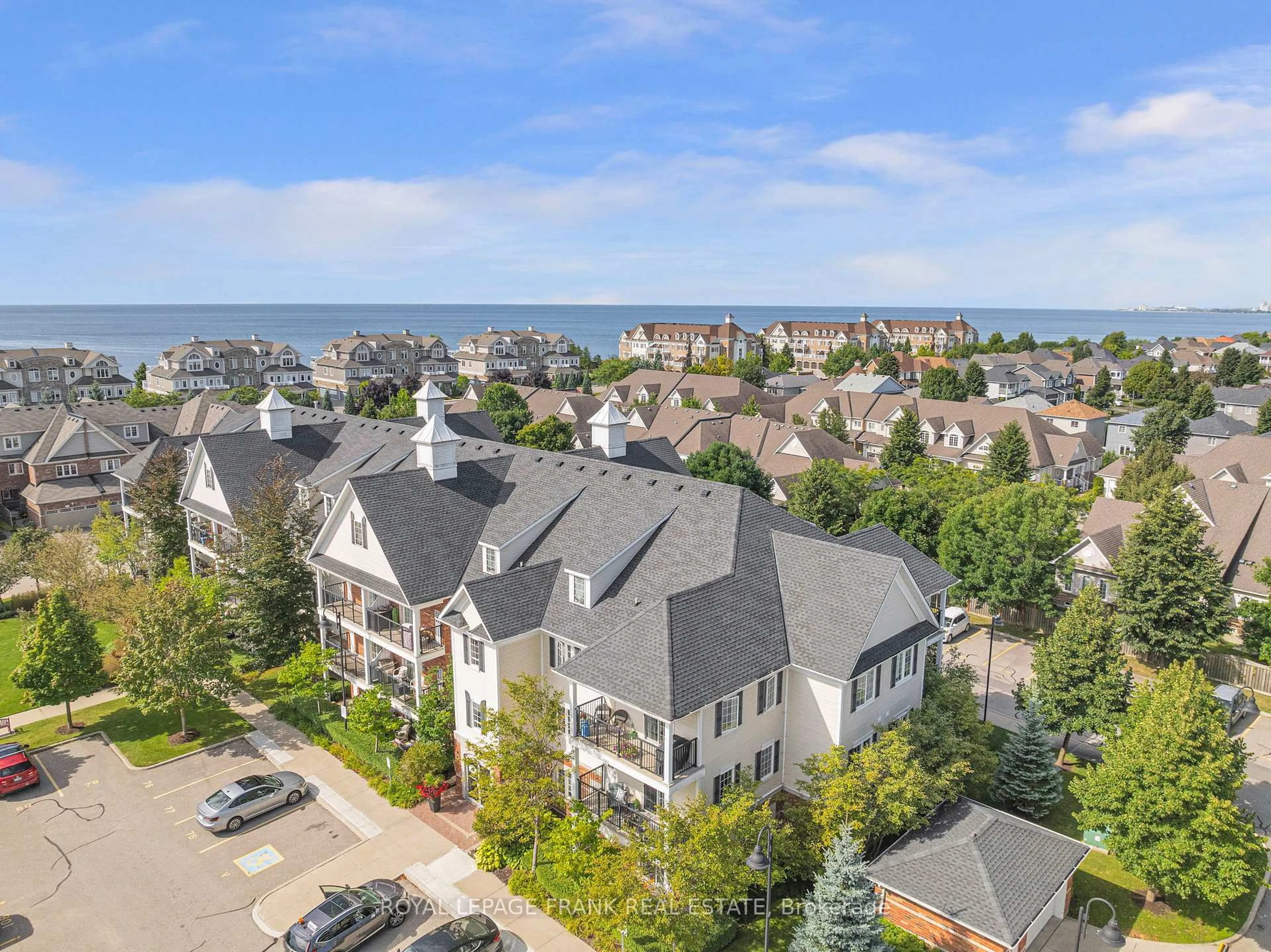 A pic from outside/outdoor area/front of a property/back of a property/a pic from drone, city buildings view from balcony for 75 Shipway Ave #301, Clarington Ontario L1B 0B8