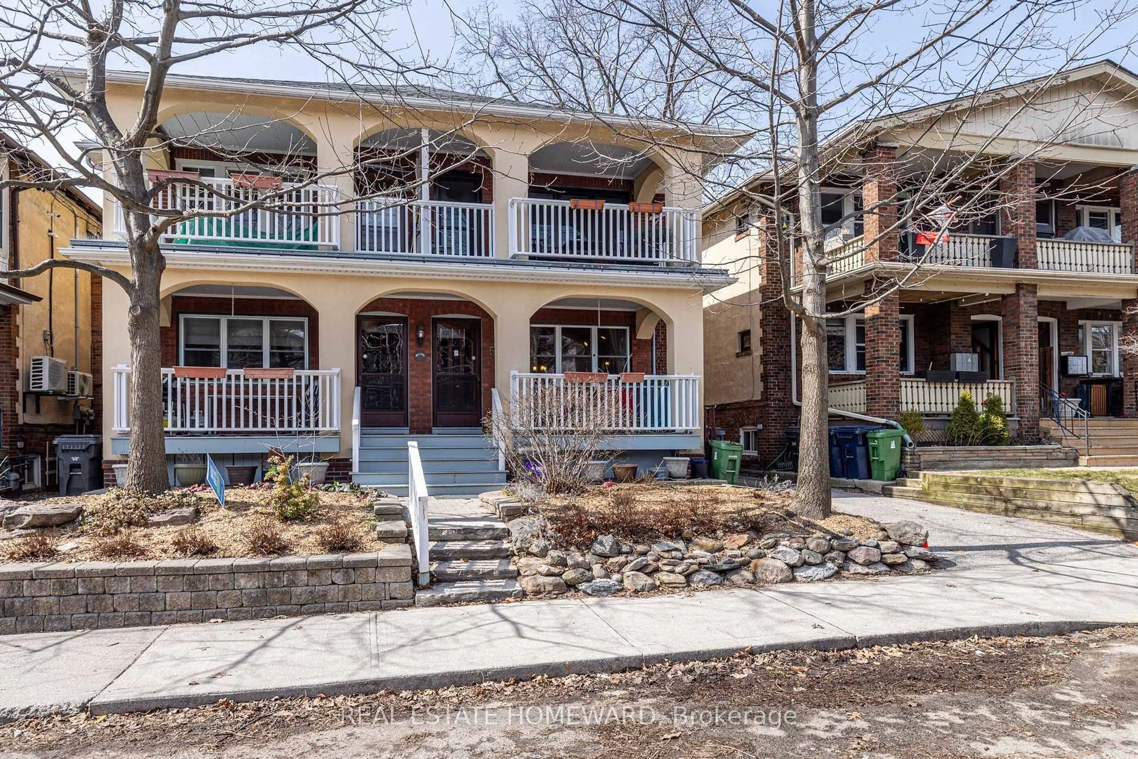 Home with brick exterior material, street for 52 Wineva Ave #main, Toronto Ontario M4E 2T2