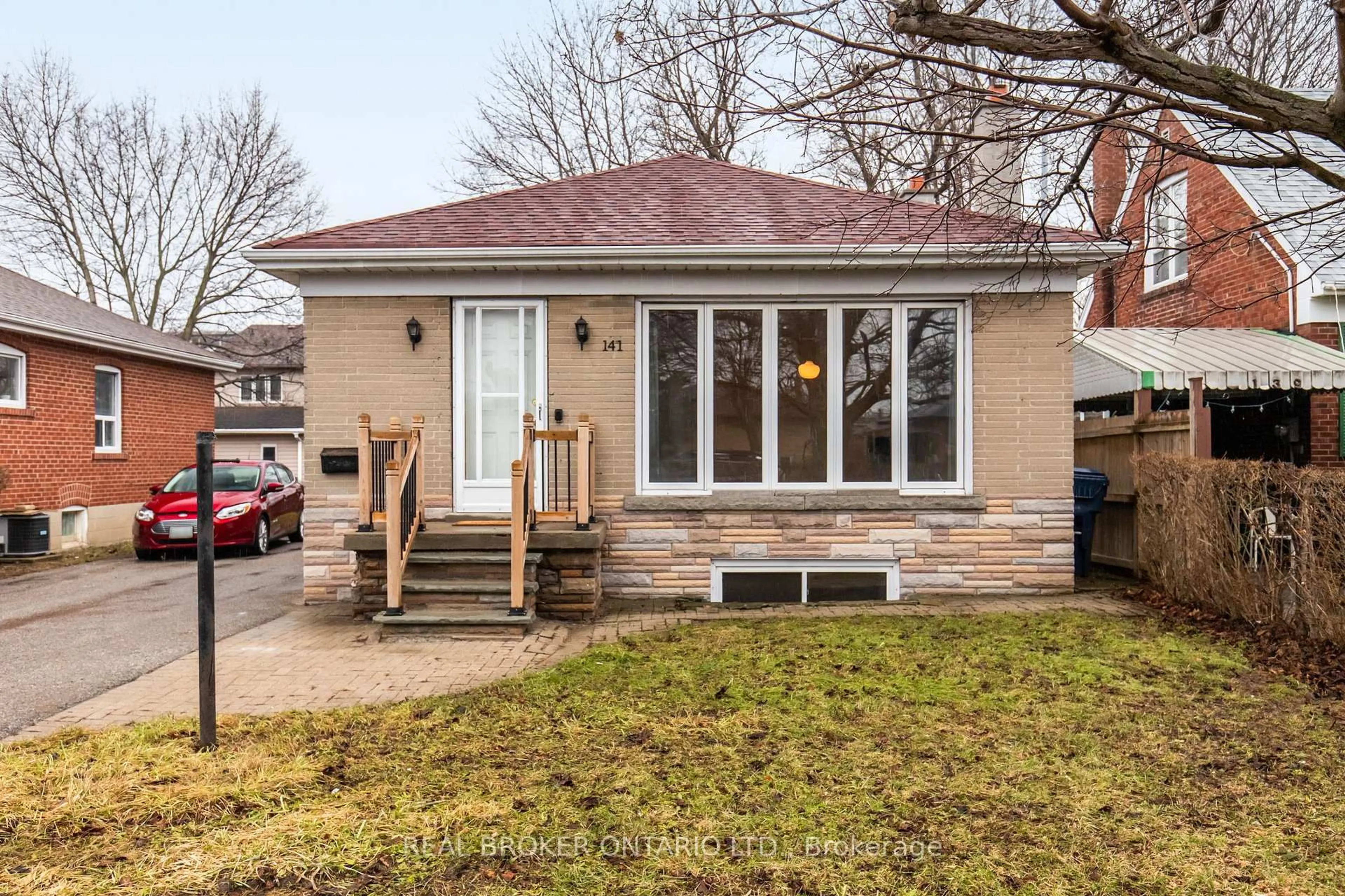 Home with brick exterior material, street for 141 Ellesmere Rd, Toronto Ontario M1R 4C3