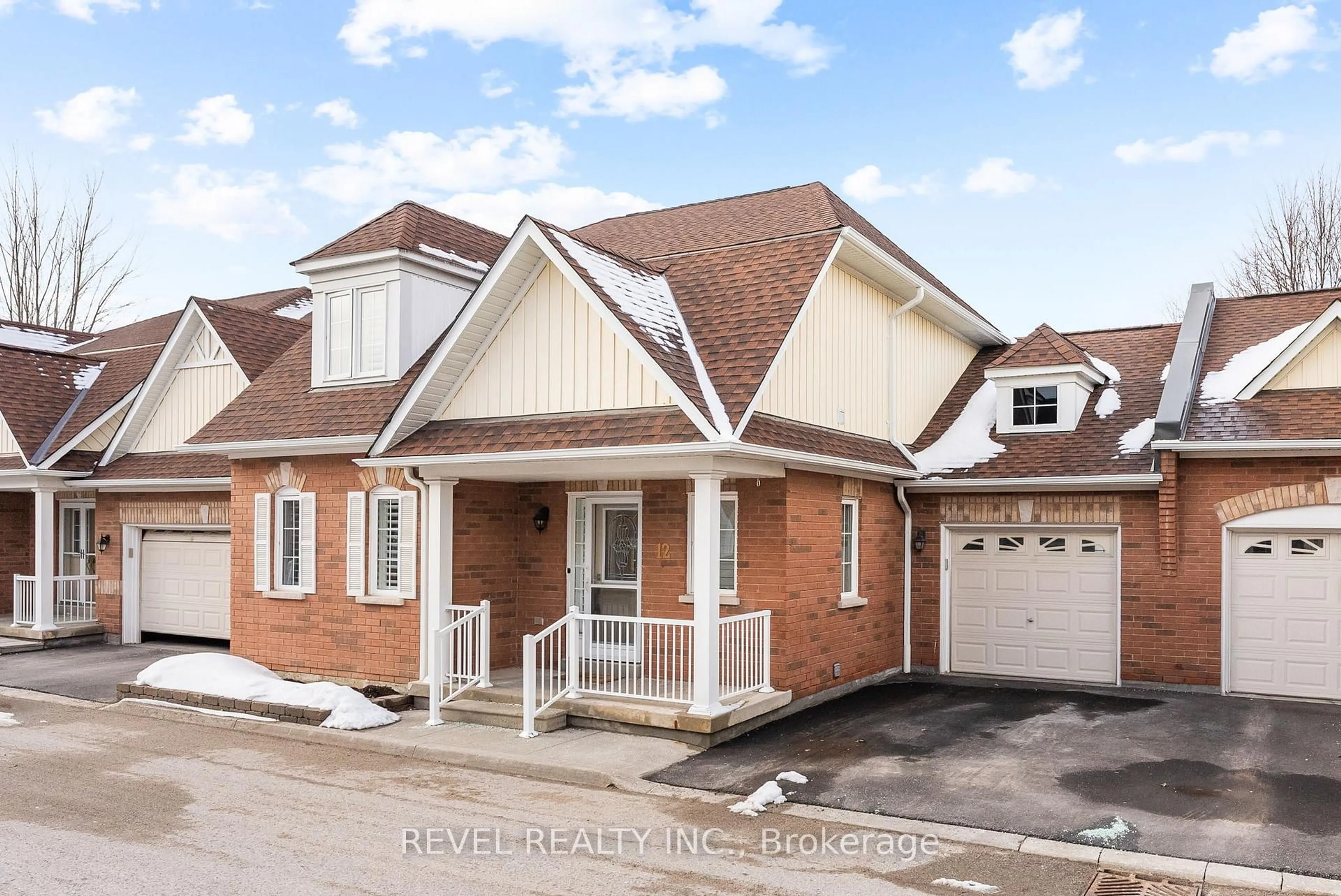 Home with brick exterior material, street for 12 Hirshfield Lane, Ajax Ontario L1T 4Z7