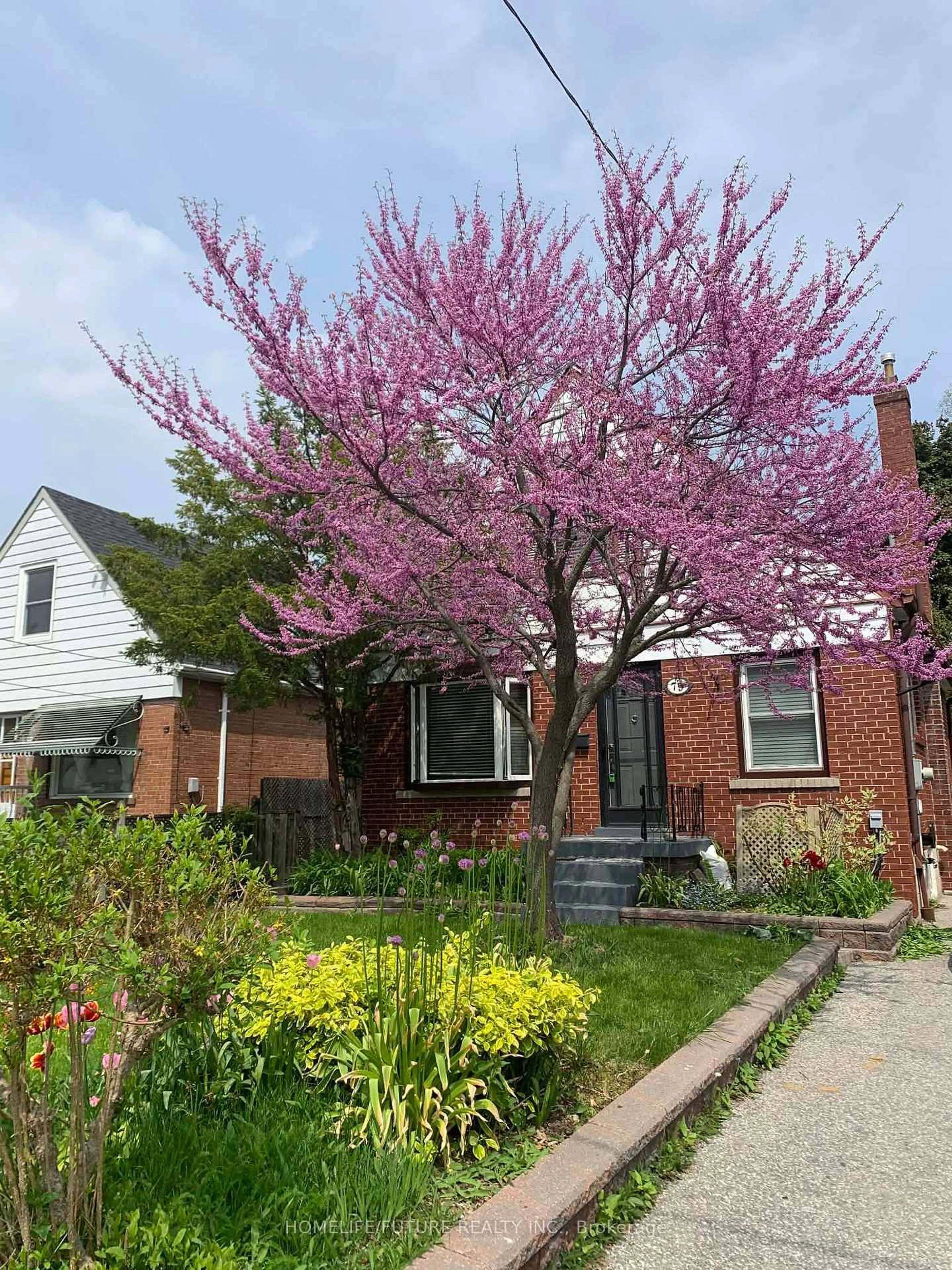 Home with brick exterior material, street for 79 Ellington Dr, Toronto Ontario M1R 3Y2