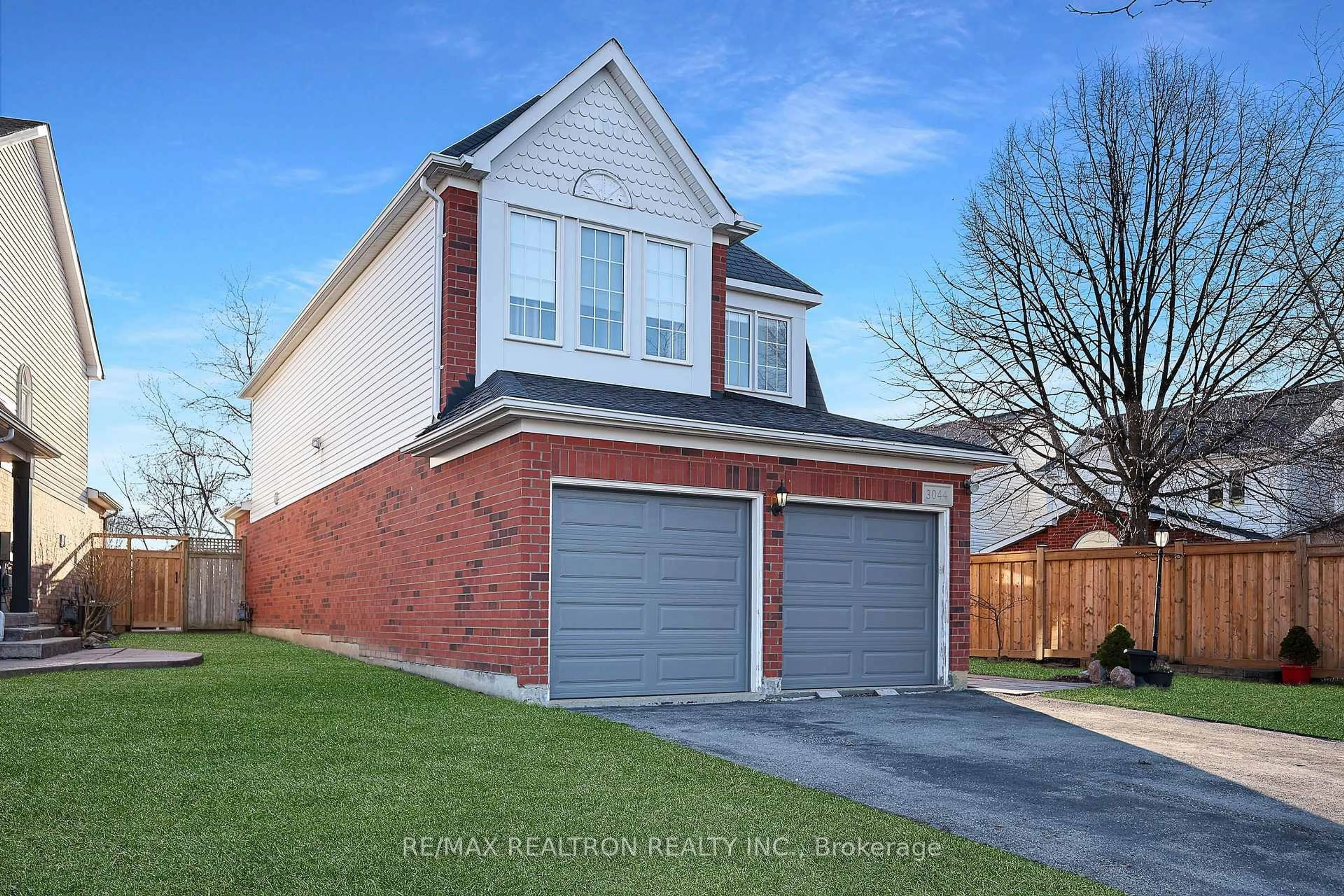 Home with brick exterior material, street for 3044 Country Lane, Whitby Ontario L1P 1T1