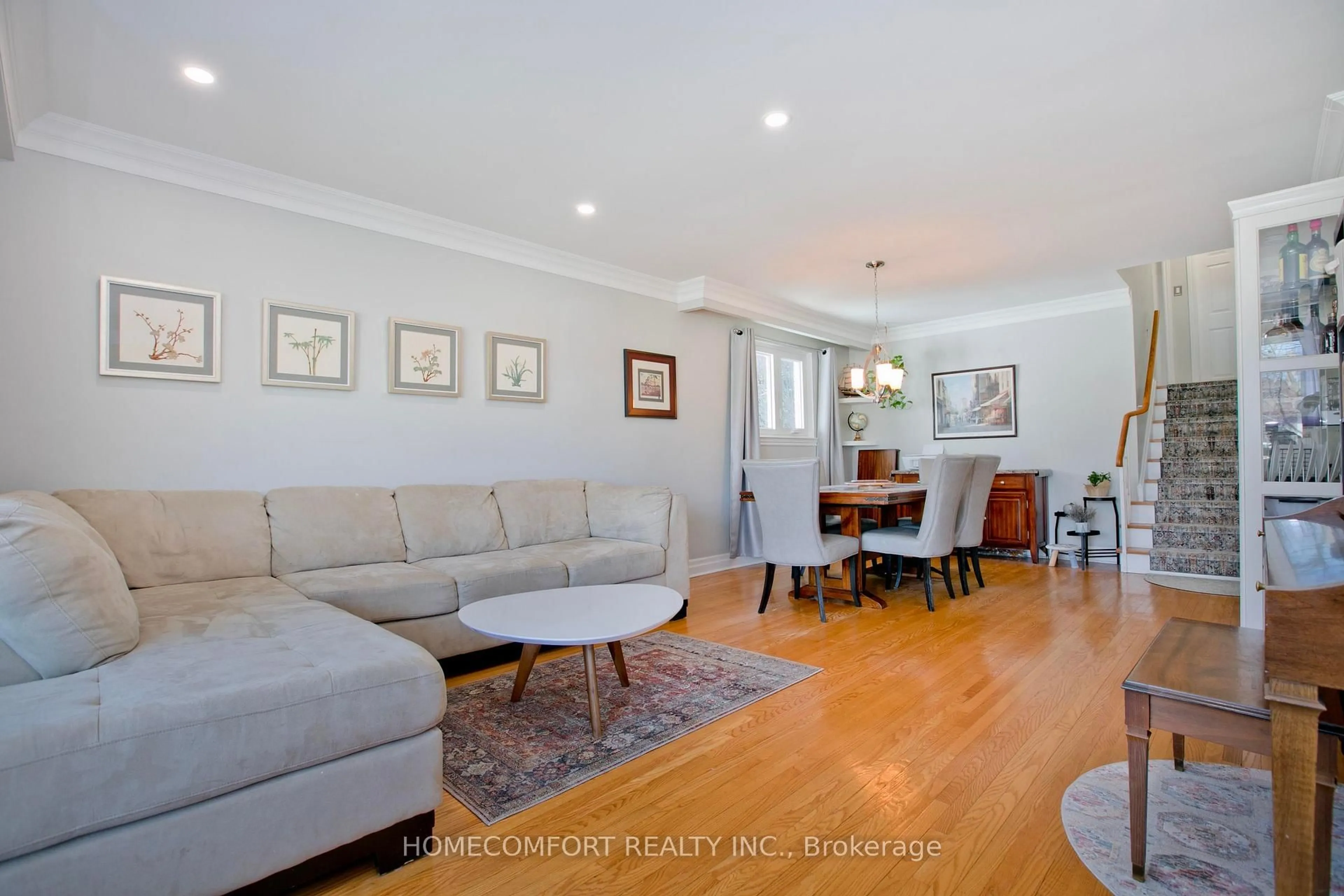 Living room with furniture, wood/laminate floor for 47 Tivoli Crt, Toronto Ontario M1E 2A5