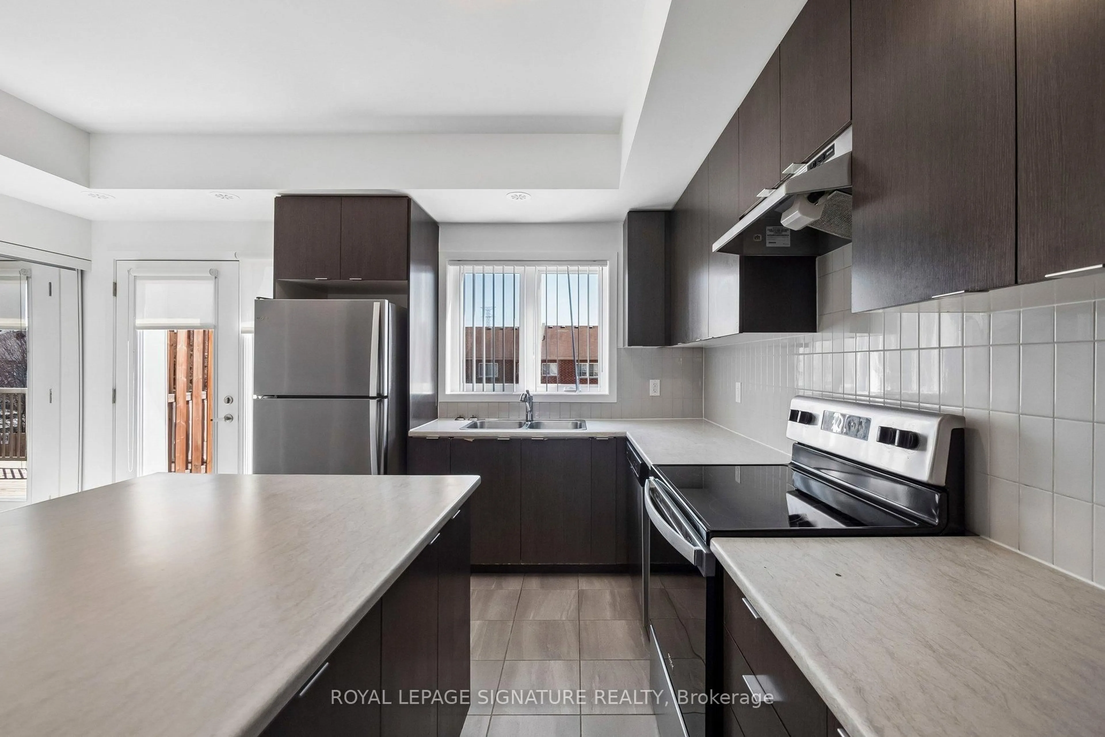 Open concept kitchen, unknown for 1525 Kingston Rd #203, Pickering Ontario L1V 0E9