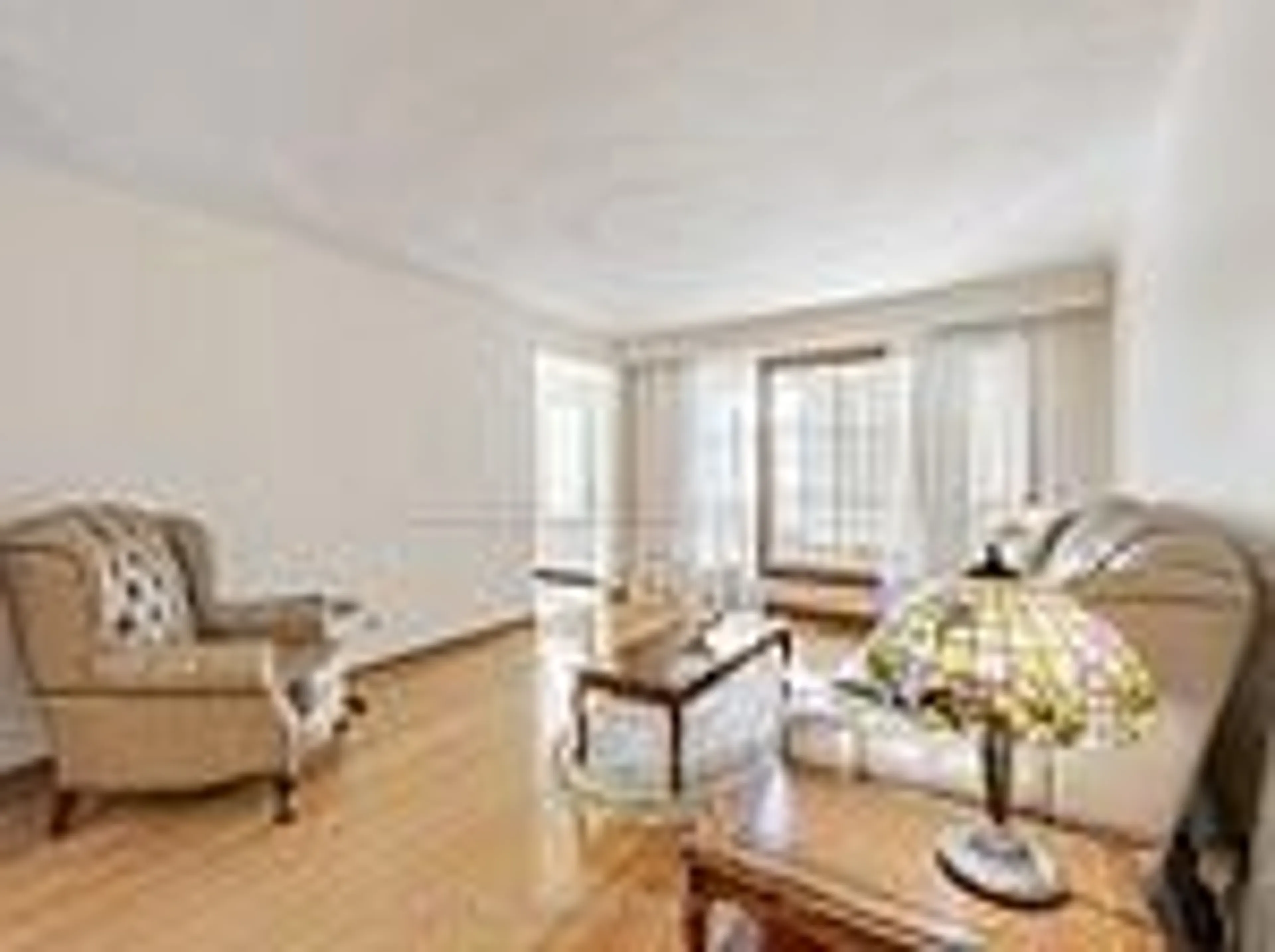 Living room with furniture, wood/laminate floor for 205 Vauxhall Dr, Toronto Ontario M1P 1R6