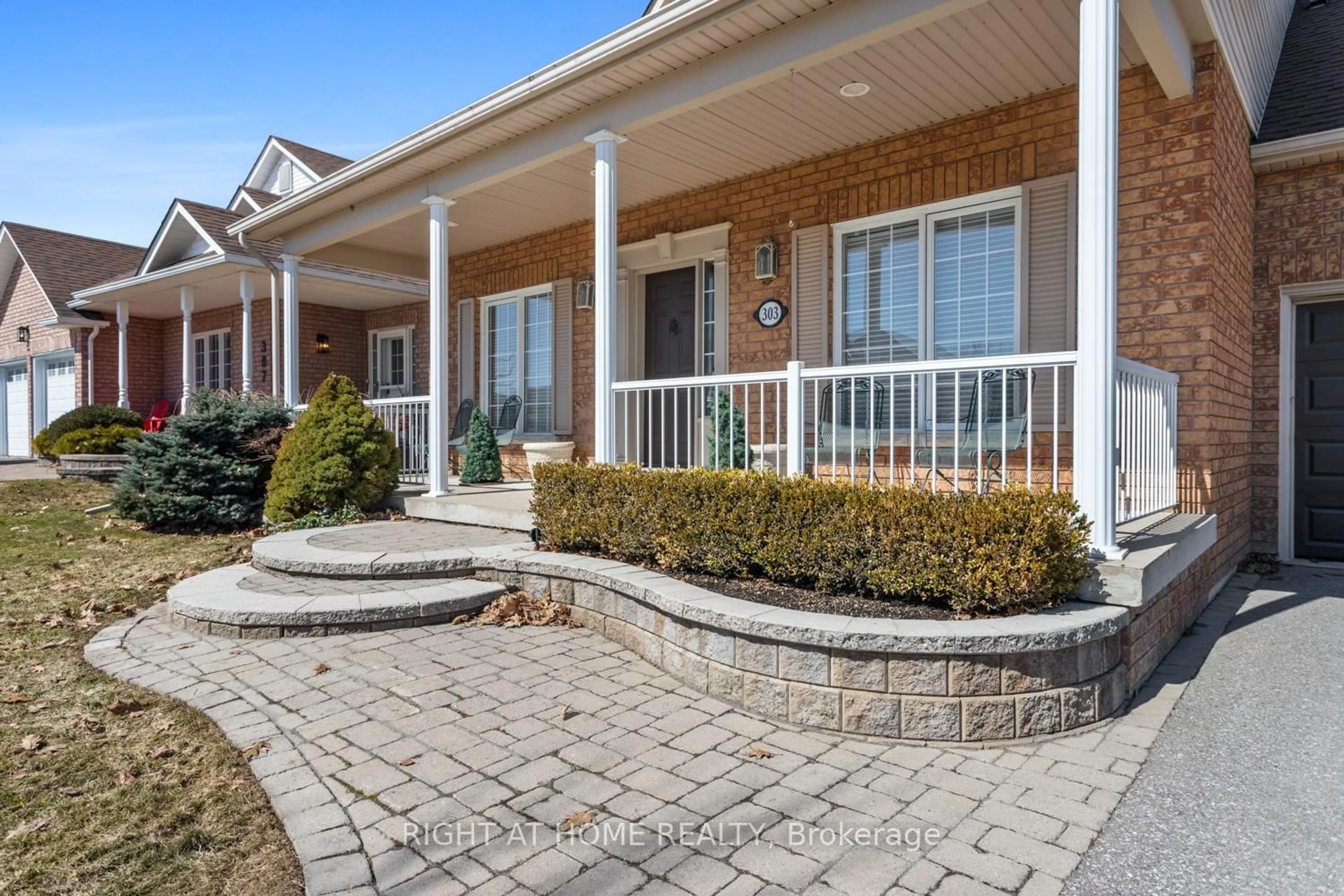 Home with brick exterior material, street for 303 WATERBURY Cres, Scugog Ontario L9L 1S5