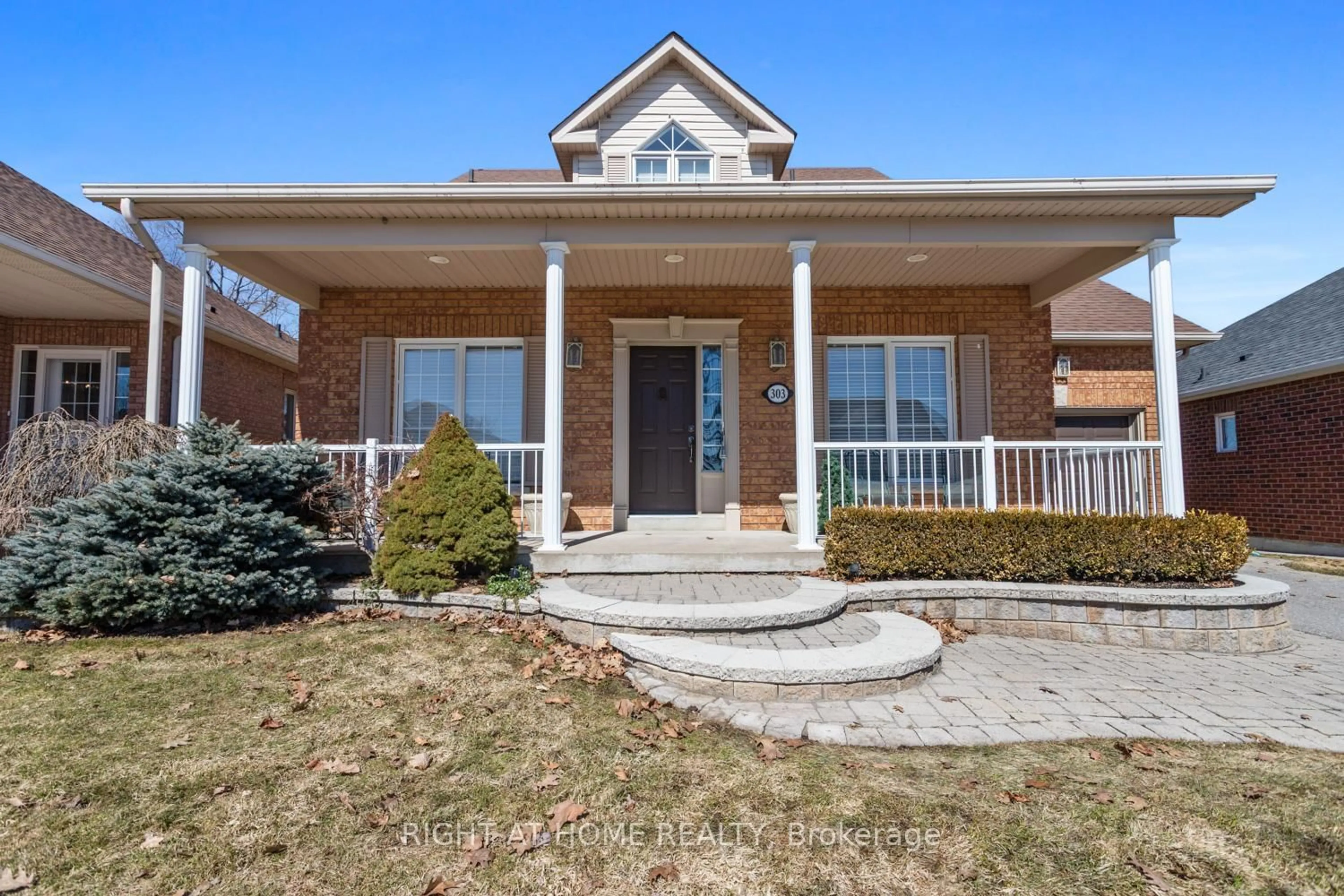 Home with brick exterior material, street for 303 WATERBURY Cres, Scugog Ontario L9L 1S5