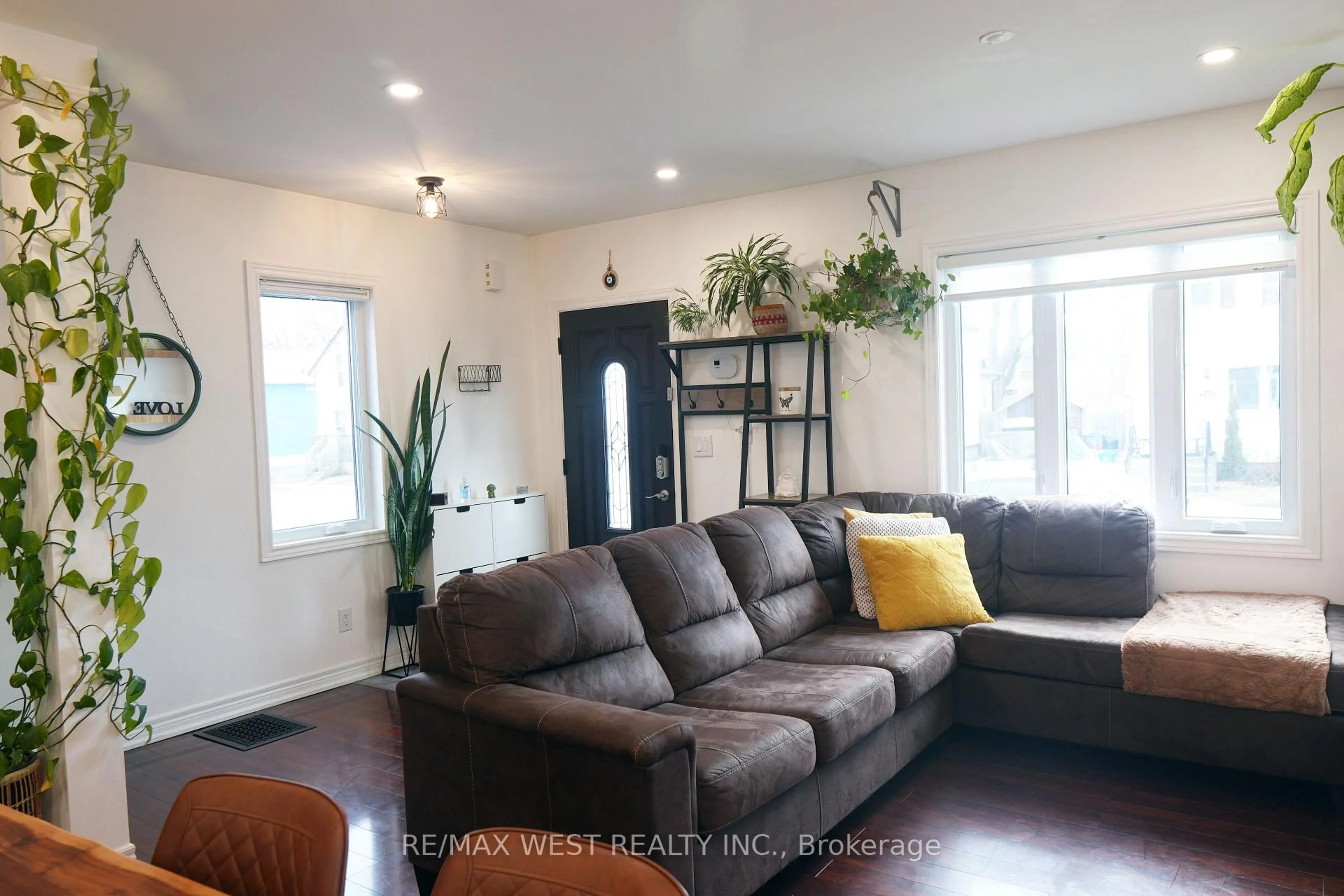 Living room with furniture, unknown for 203 Court St, Oshawa Ontario L1H 4W6