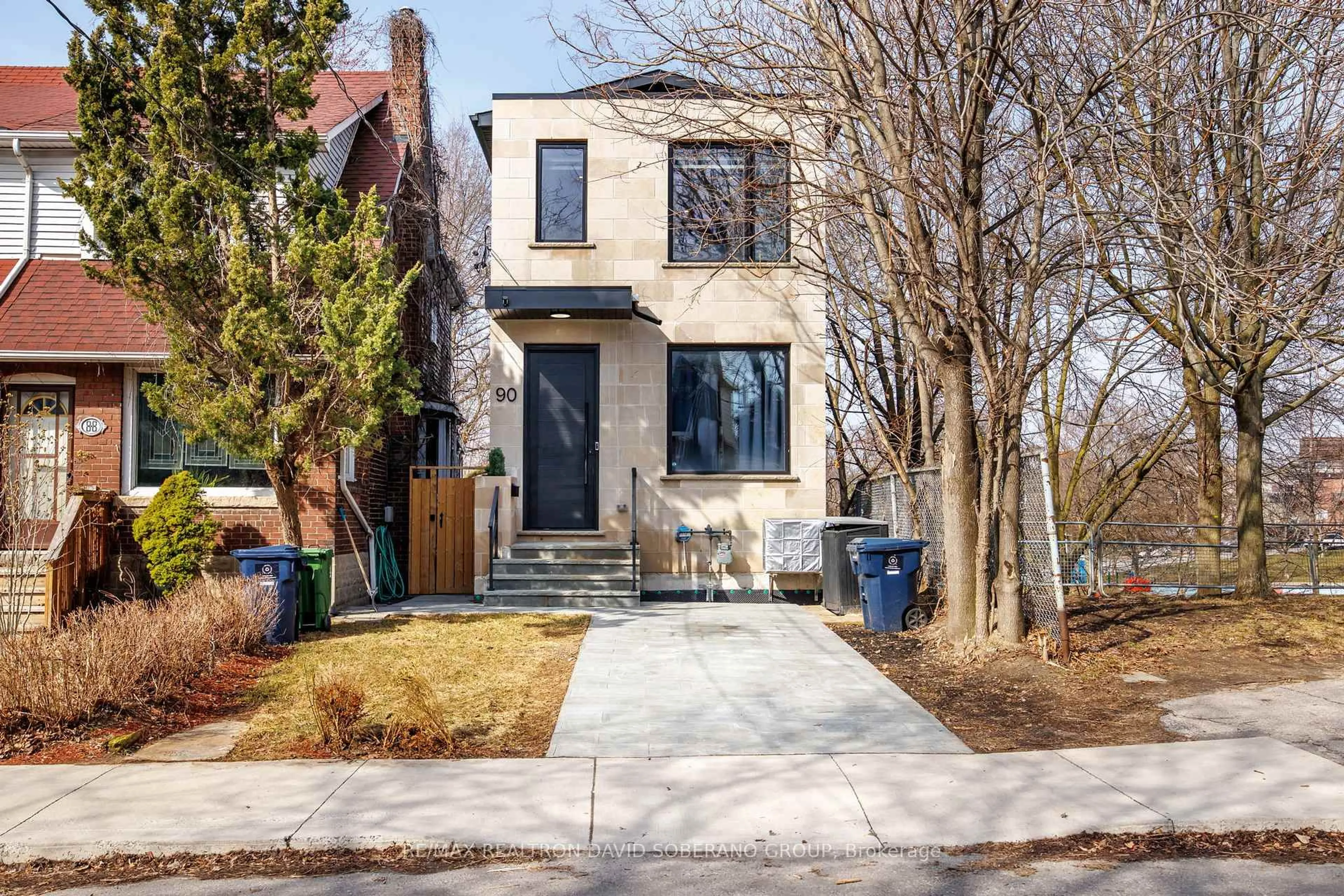 Home with brick exterior material, street for 90 East Lynn Ave, Toronto Ontario M4C 3X2