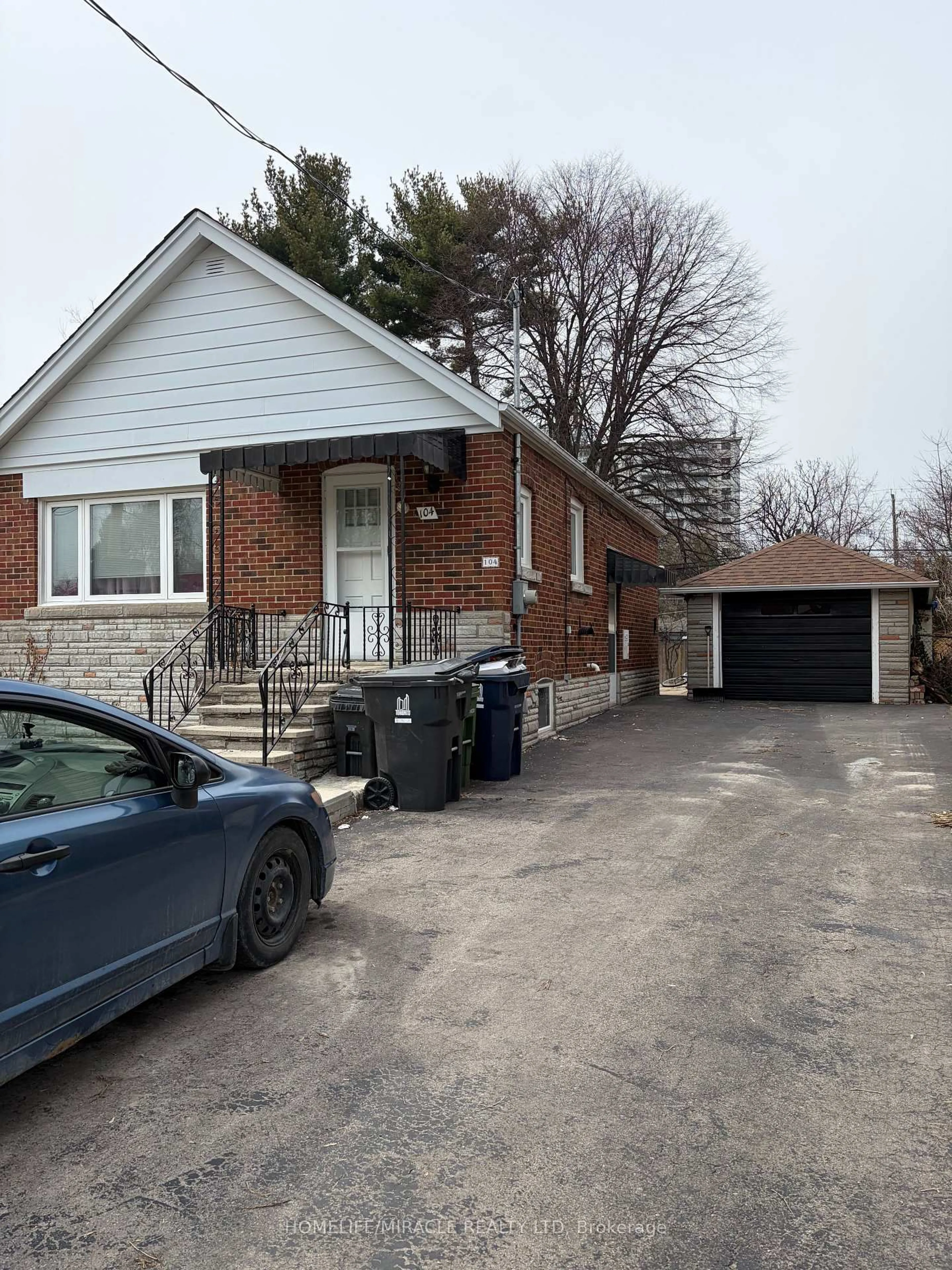Home with brick exterior material, street for 104 Meighen Ave, Toronto Ontario M4B 2H7