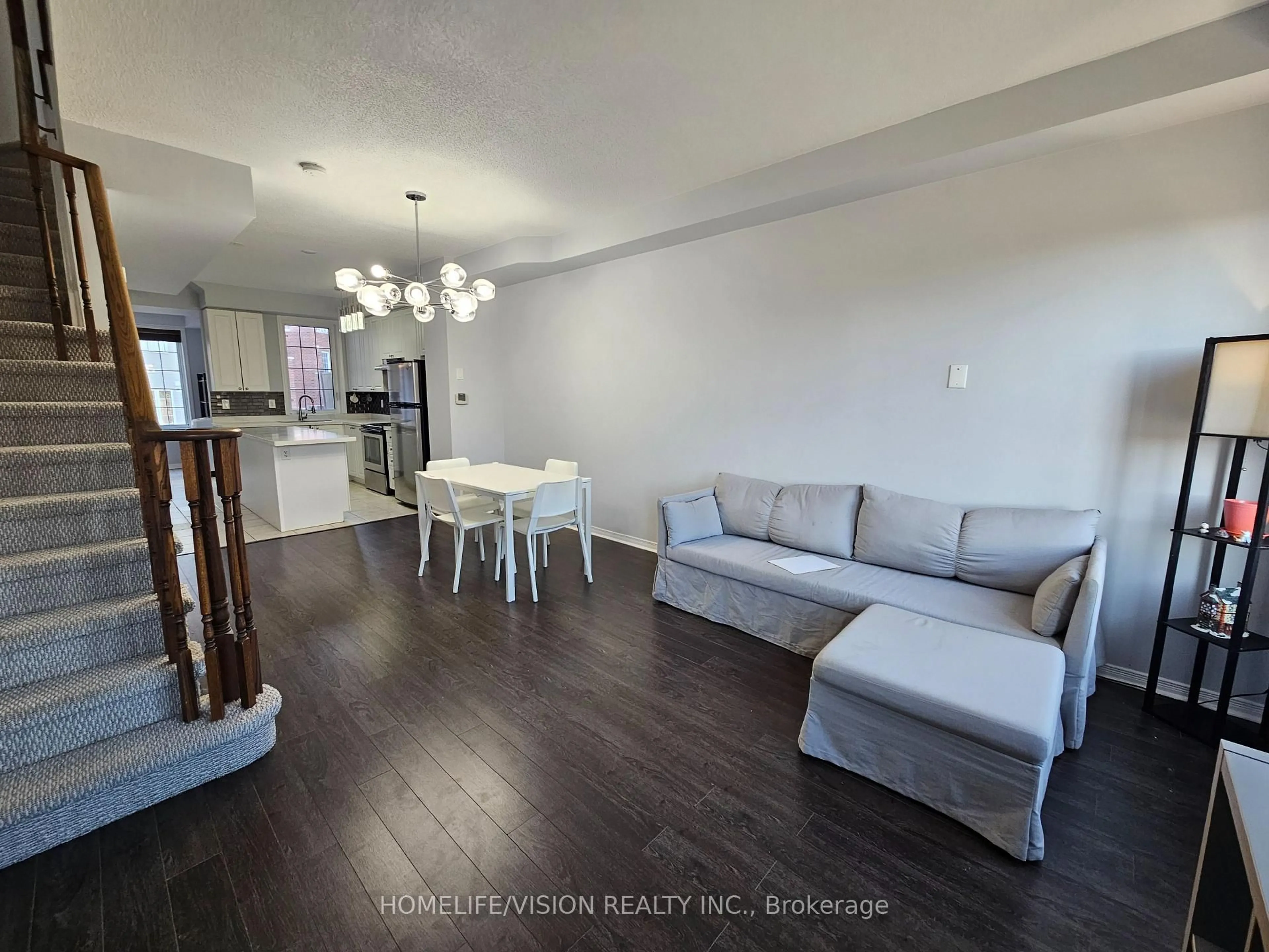 Living room with furniture, wood/laminate floor for 397 Beechgrove Dr #68, Toronto Ontario M1E 2R1