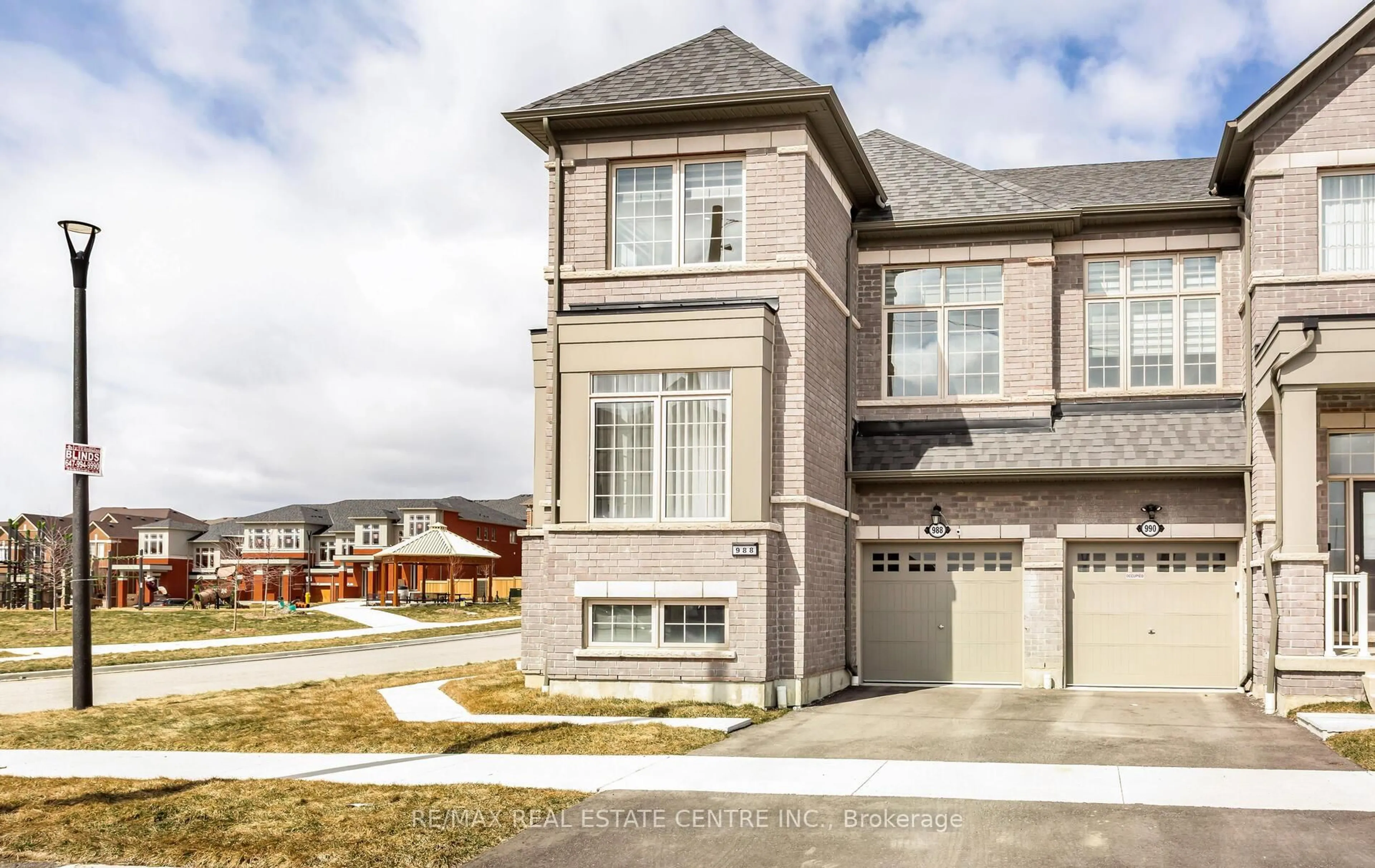 Home with brick exterior material, street for 988 Grosbeak Tr, Pickering Ontario L1X 0P6