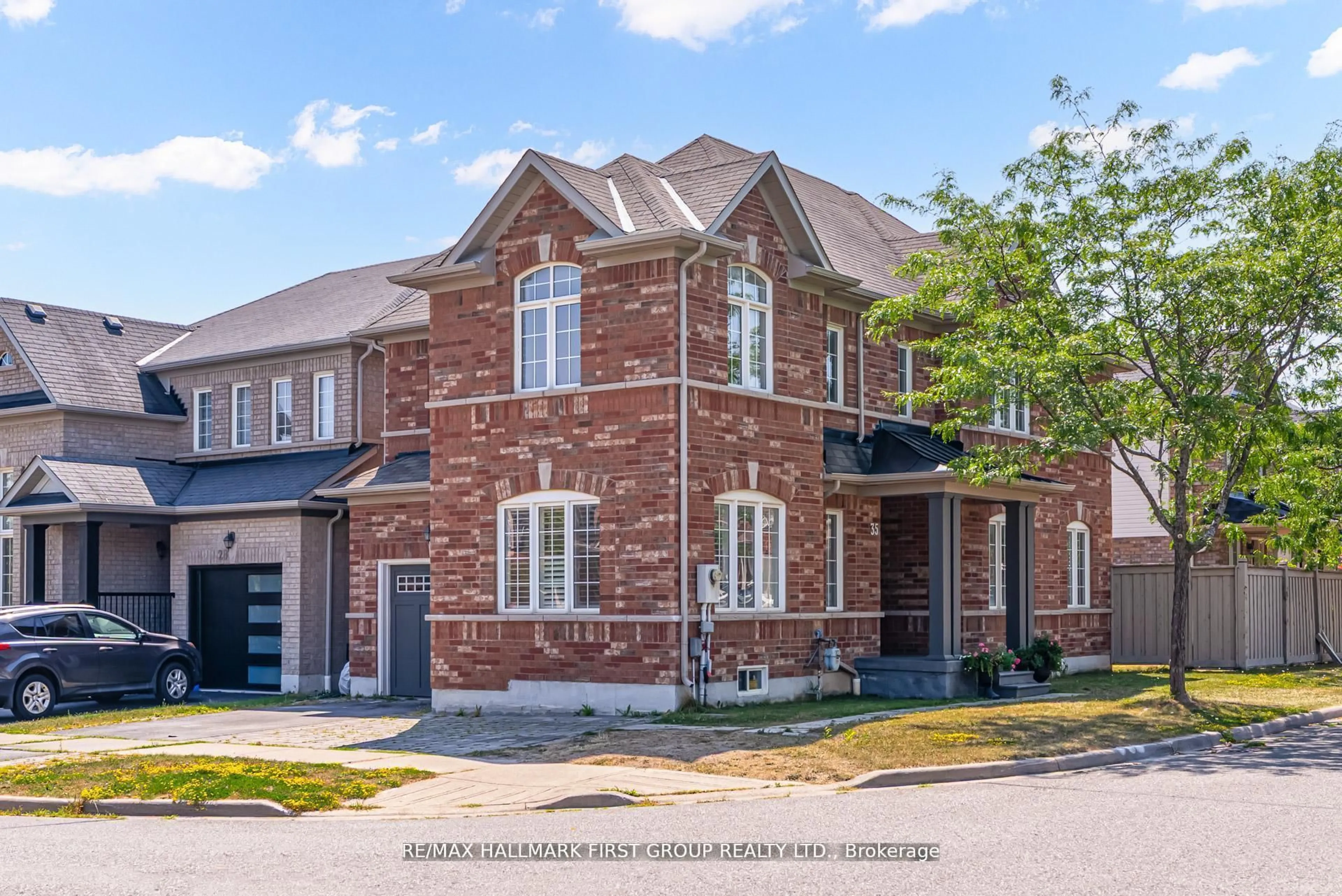 Home with brick exterior material, street for 35 Elliottglen Dr, Ajax Ontario L1Z 0H1