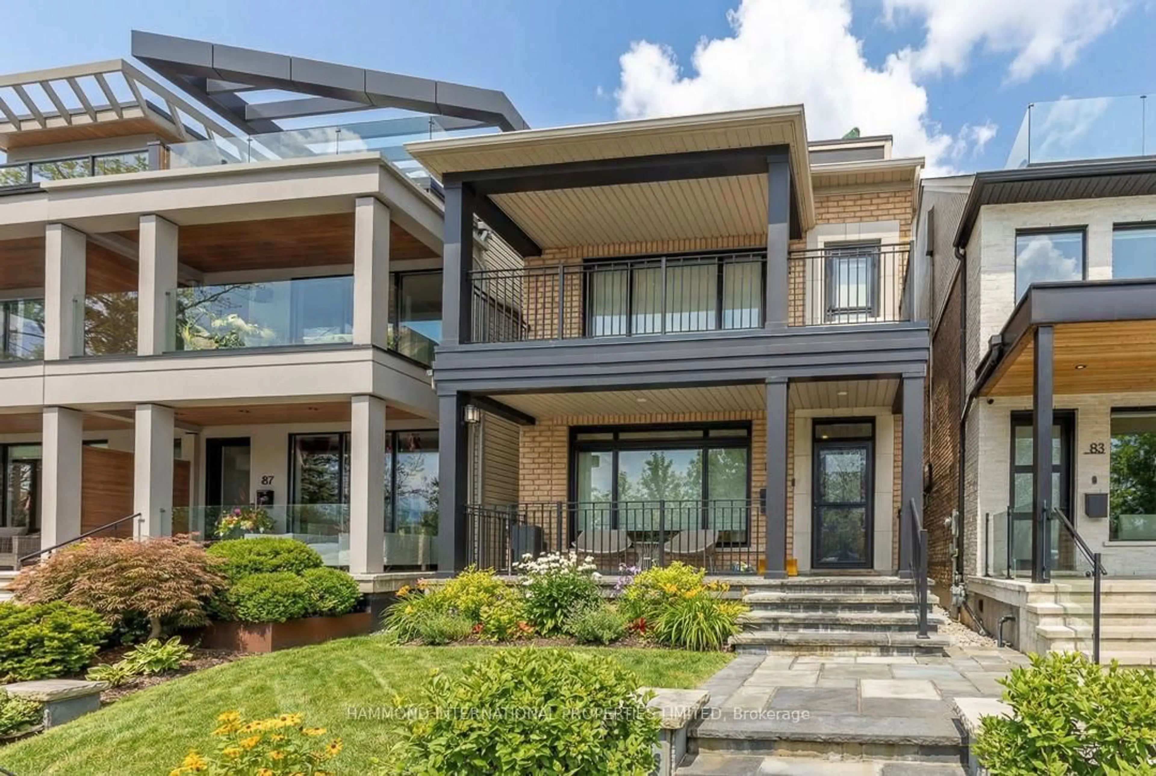 Home with brick exterior material, street for 85 Northern Dancer Blvd, Toronto Ontario M4L 3Z8